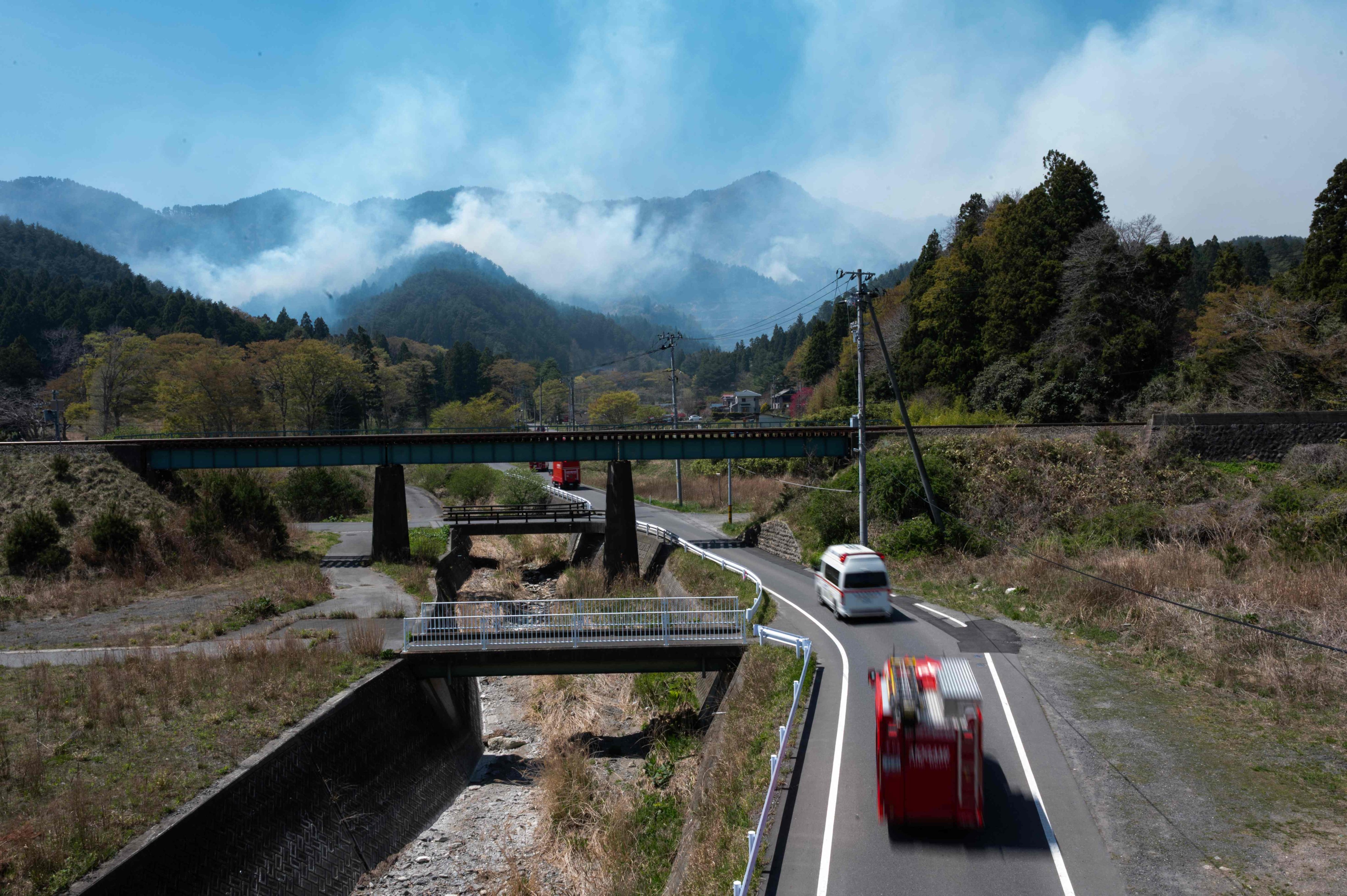 A convoy of fire trucks make their way to the fire in the town of Otsuchi in Iwate Prefecture, northern Honshu, Japan on Sunday. Photo: AFP