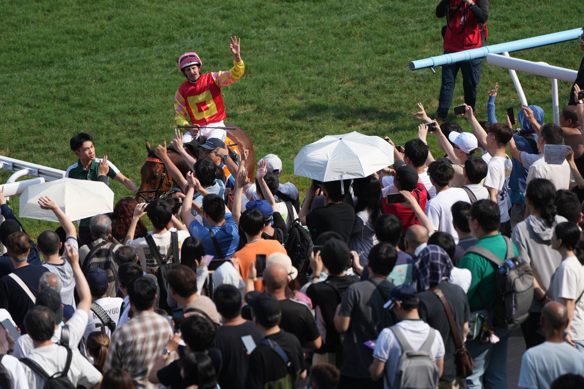 Hugh Bowman celebrates his Champions Mile triumph on My Wish.