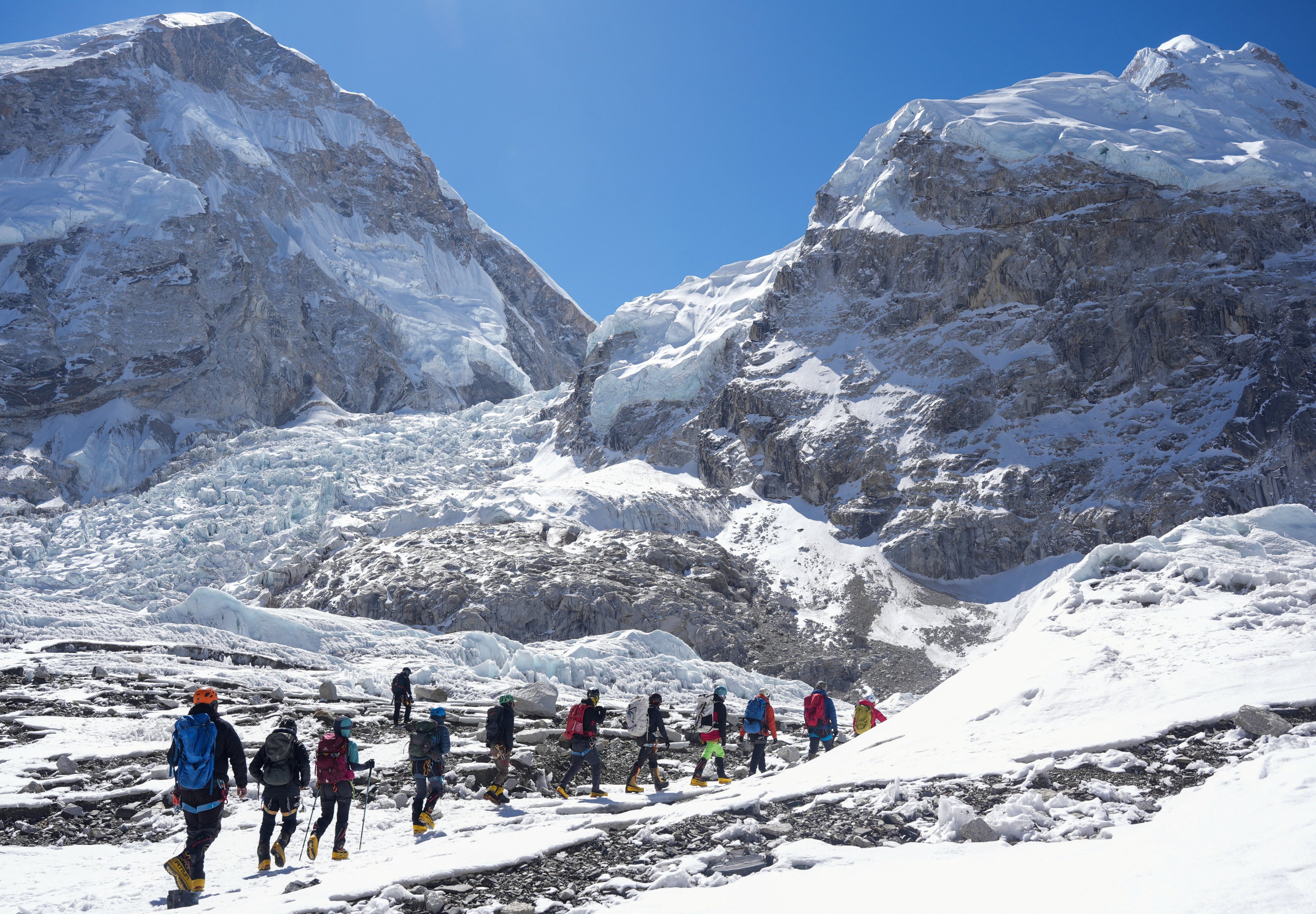 Members of an expedition team hike at Khumbu icefall on Wednesday. Photo: Reuters