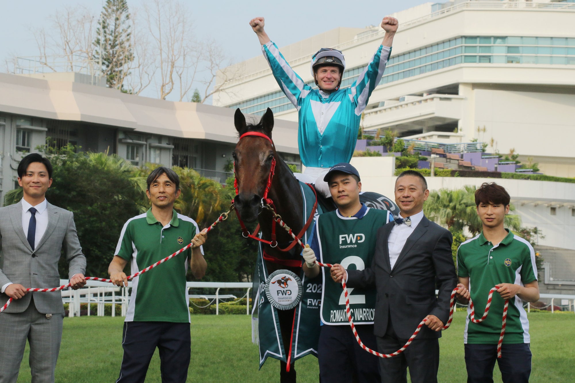 Jockey James McDonald celebrates Romantic Warrior’s fourth QEII Cup win.