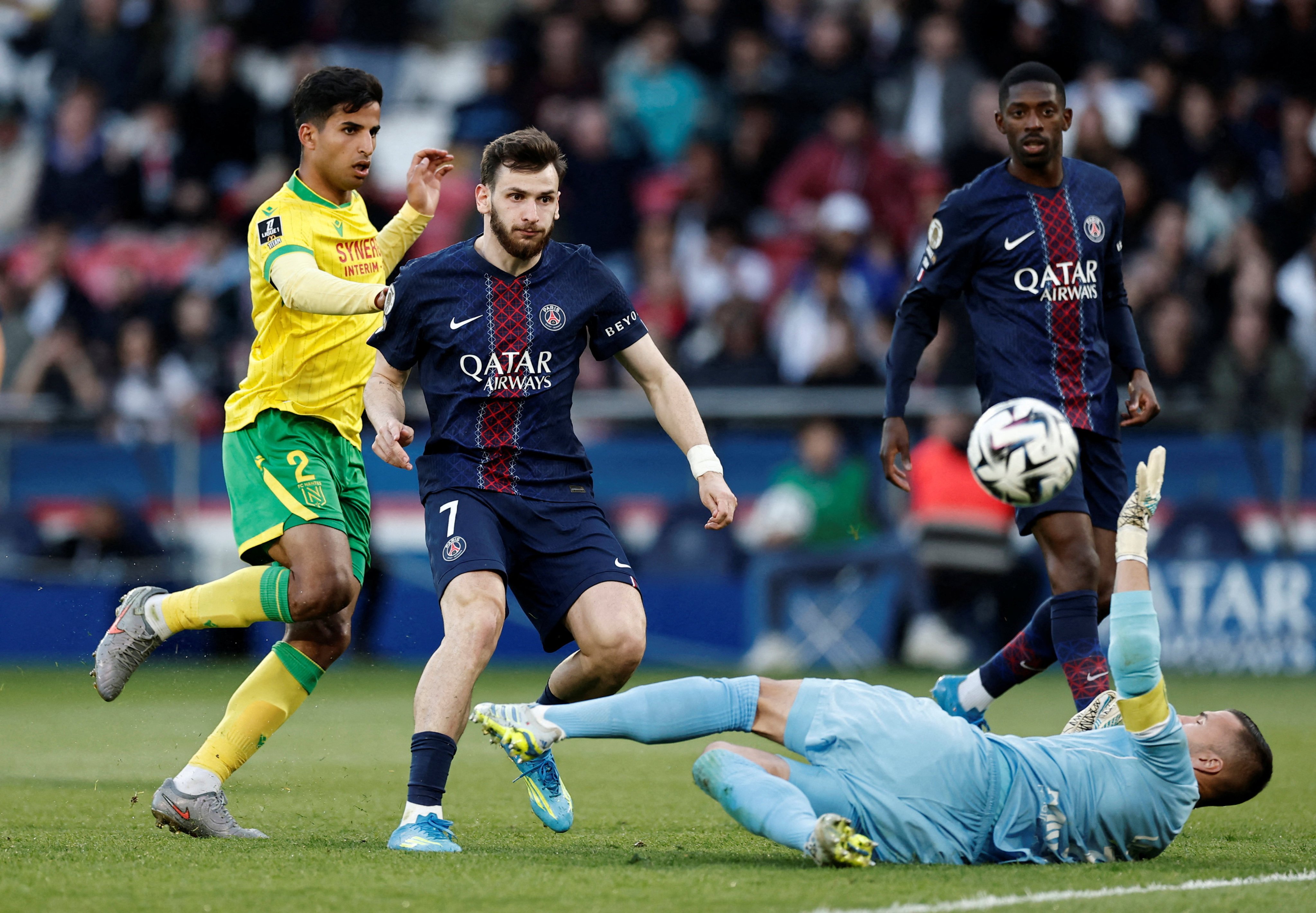 PSG have been peaking in the second half of the season, and have found a new level since signing Georgia winger Khvicha Kvaratskhelia (middle) in January last year. Photo: Reuters