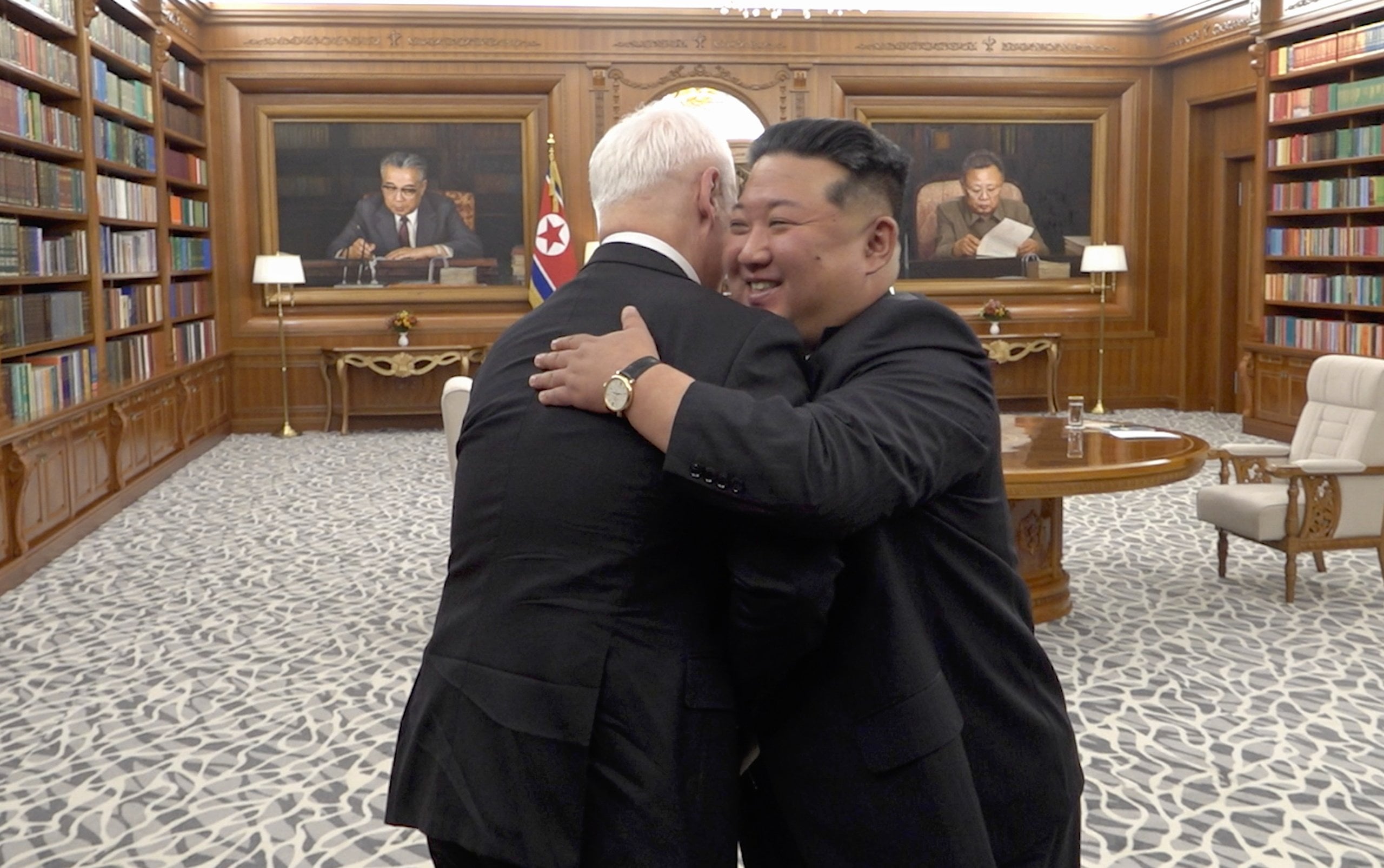 North Korean leader Kim Jong-un ((right) greets Russian Defence Minister Andrey Belousov with a hug in Pyongyang on Sunday. Photo: Russian Defence Ministry/EPA