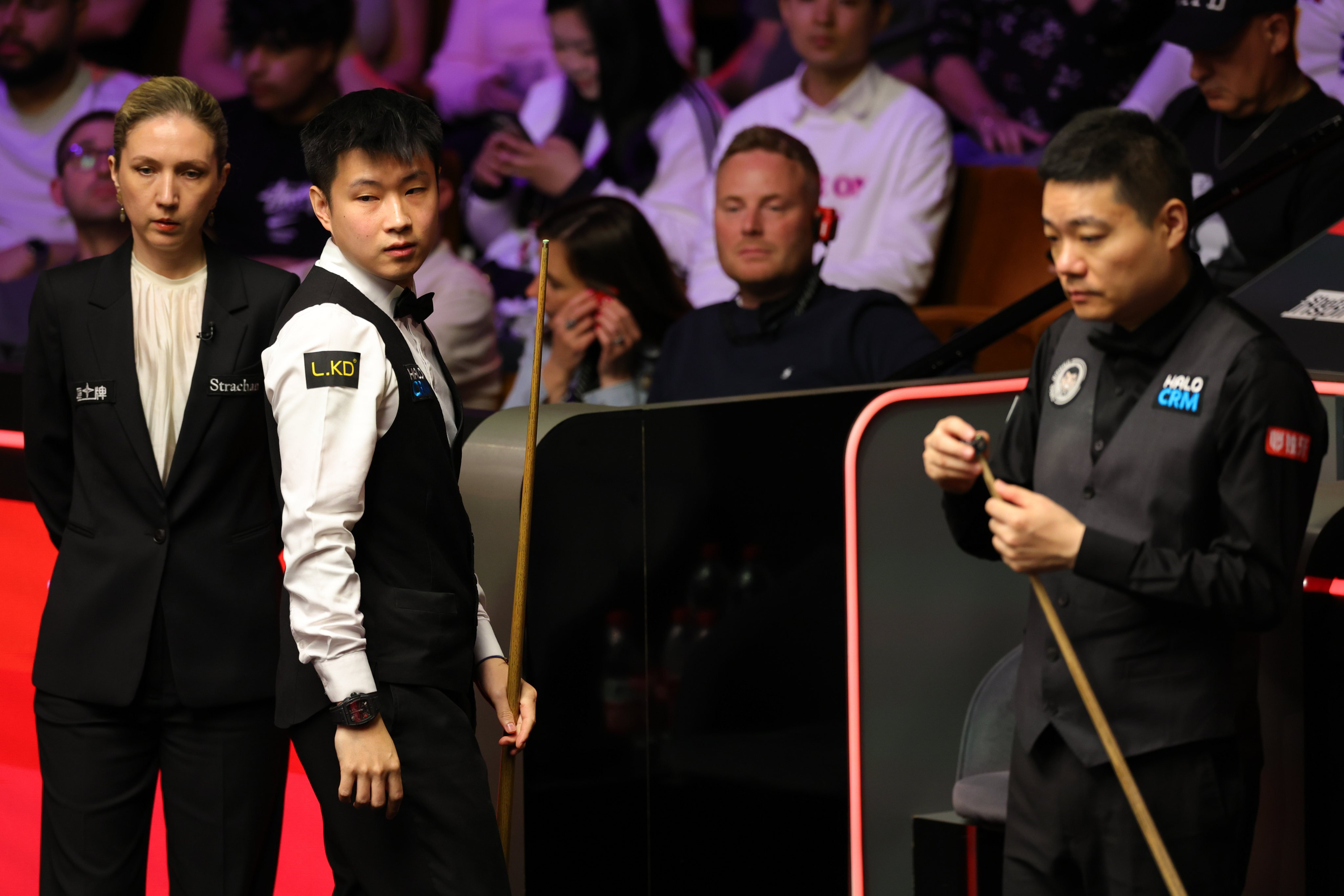 Zhao Xintong (left) overcame compatriot Ding Junhui in a tense affair at the World Snooker Championship. Photo: Xinhua
