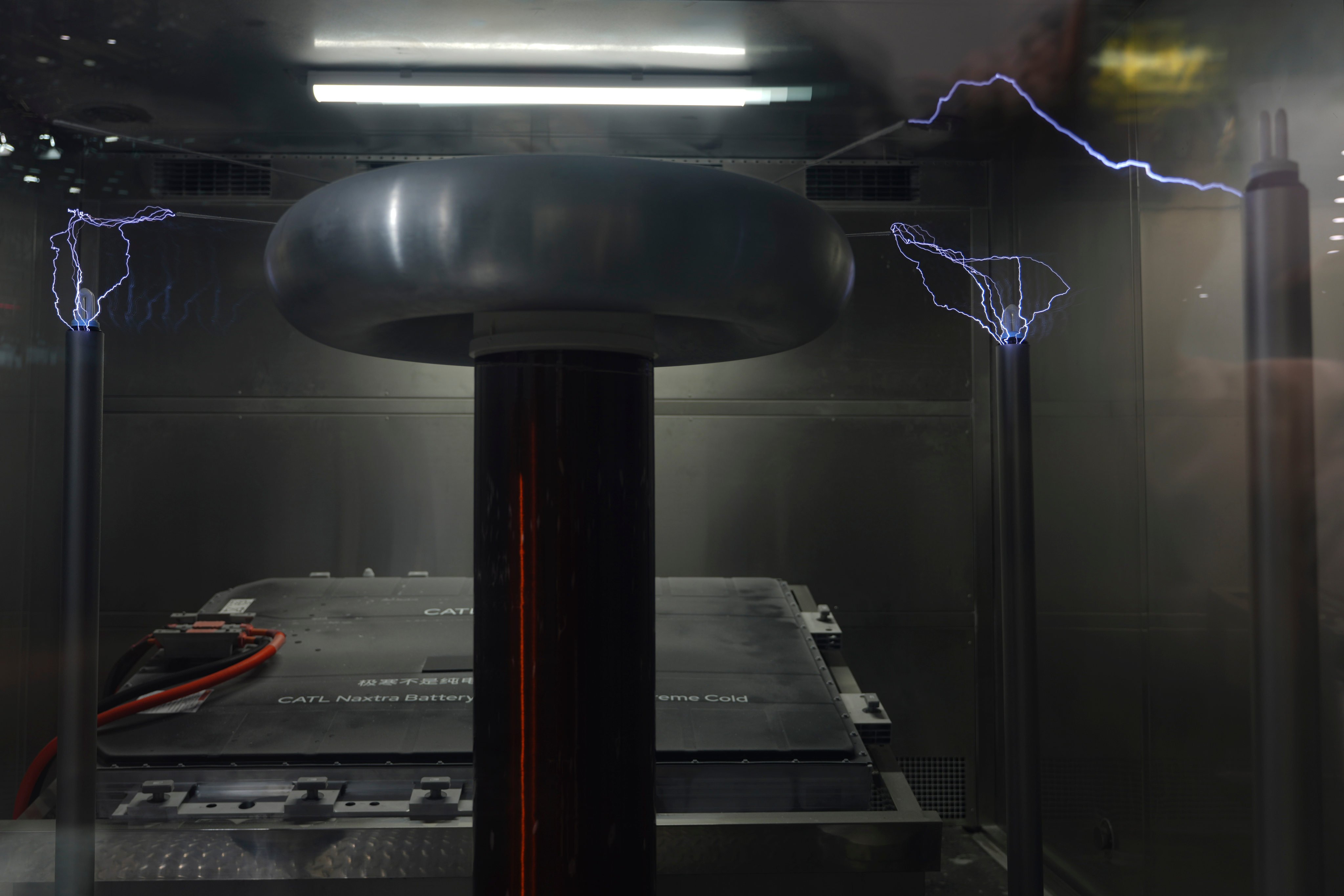 Electricity arcs in a cold-environment demonstration of CATL’s sodium-ion battery technology during Auto China 2026 in Beijing on April 25, 2026. Photo: AP Photo