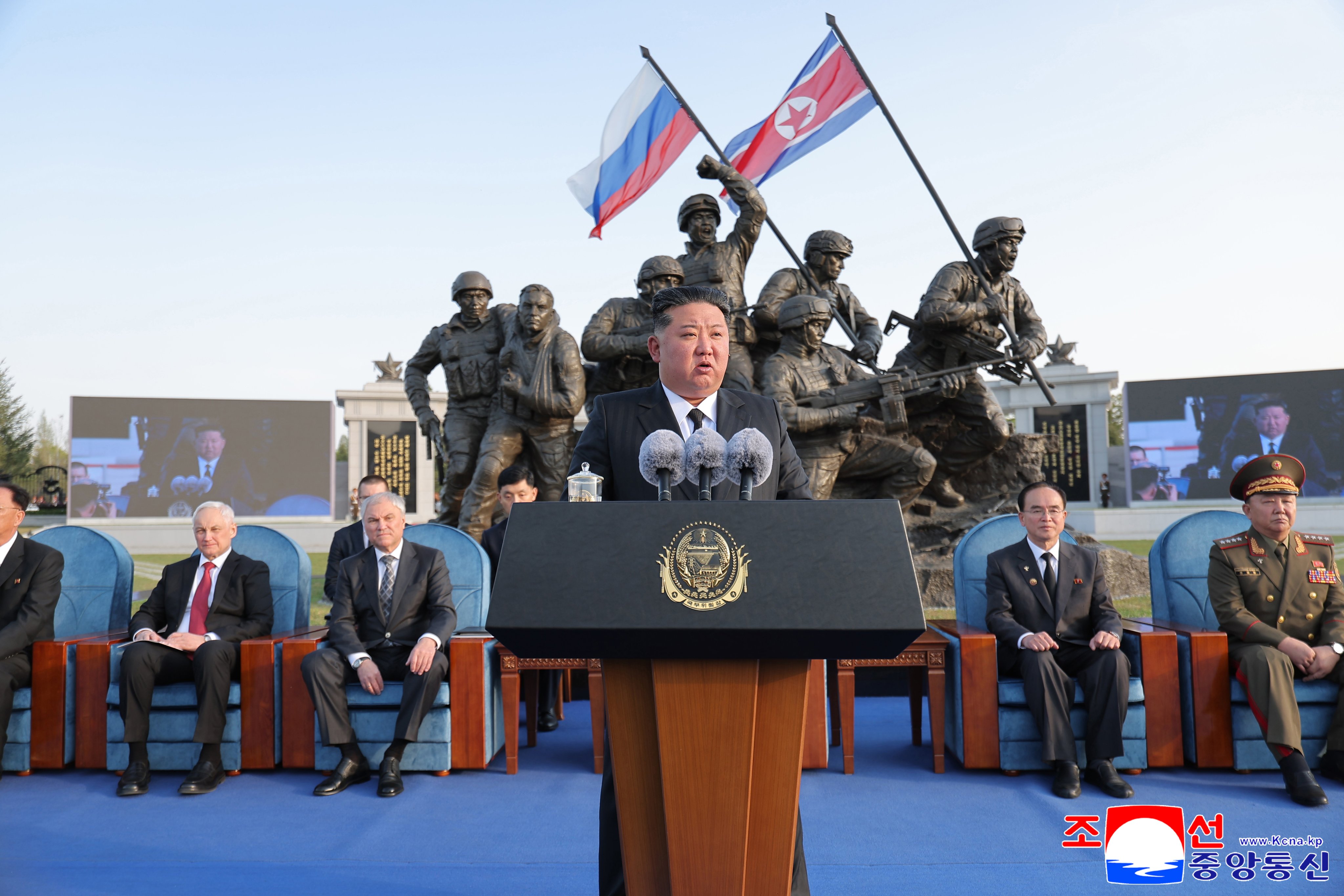 North Korean leader Kim Jong-un delivers a speech in Pyongyang on Sunday as Russian Defence Minister Andrei Belousov (left) and State Duma Speaker Vyacheslav Volodin (second left) listen during a ceremony to launch a museum dedicated to North Korean soldiers who fought in the Ukraine war. Photo: KCNA/EPA