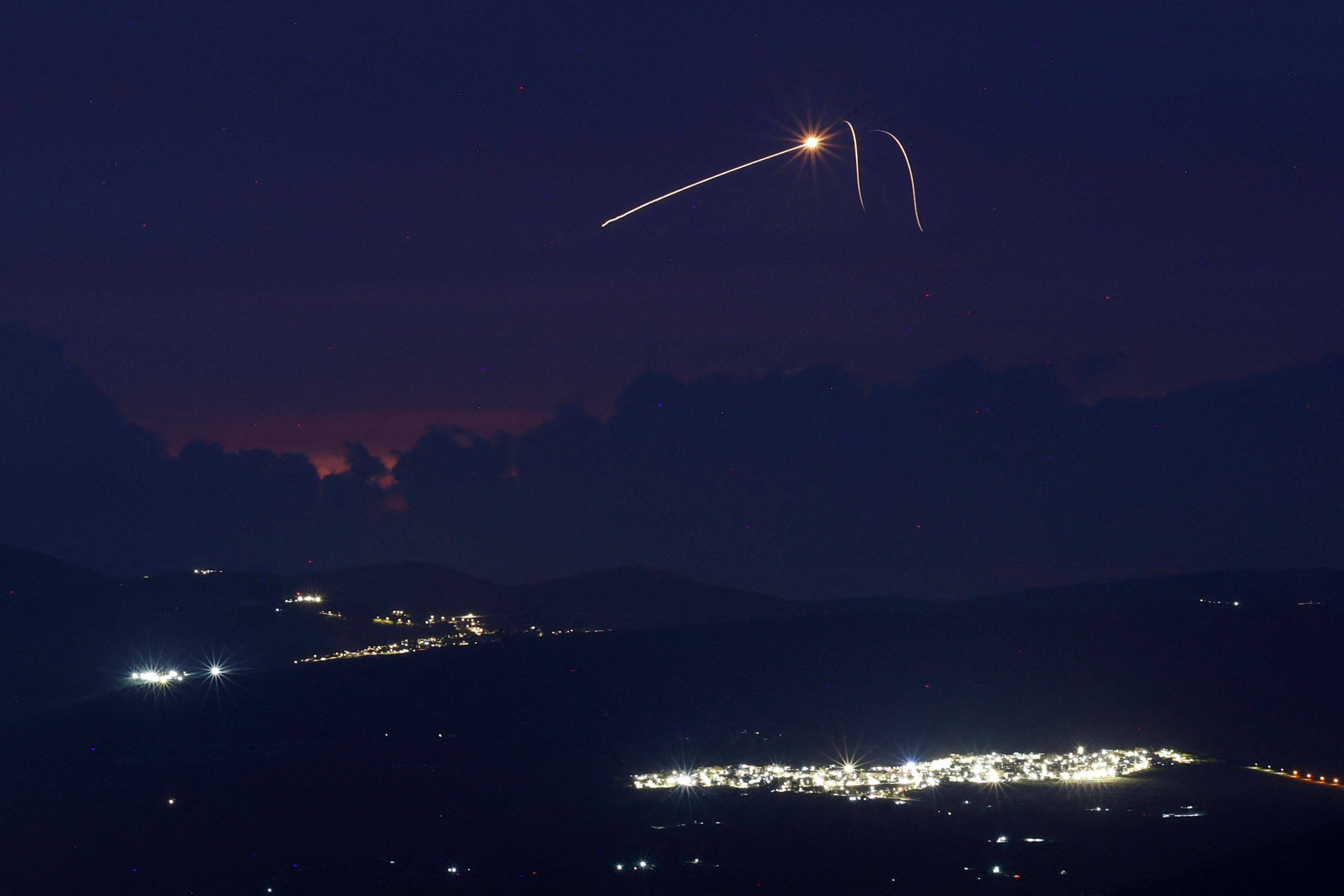 Rockets are intercepted by the Iron Dome over the Upper Galilee region in northern Israel, on April 11. A US news outlet says Israel sent an Iron Dome battery to the UAE early in the Iran war. Photo: AFP