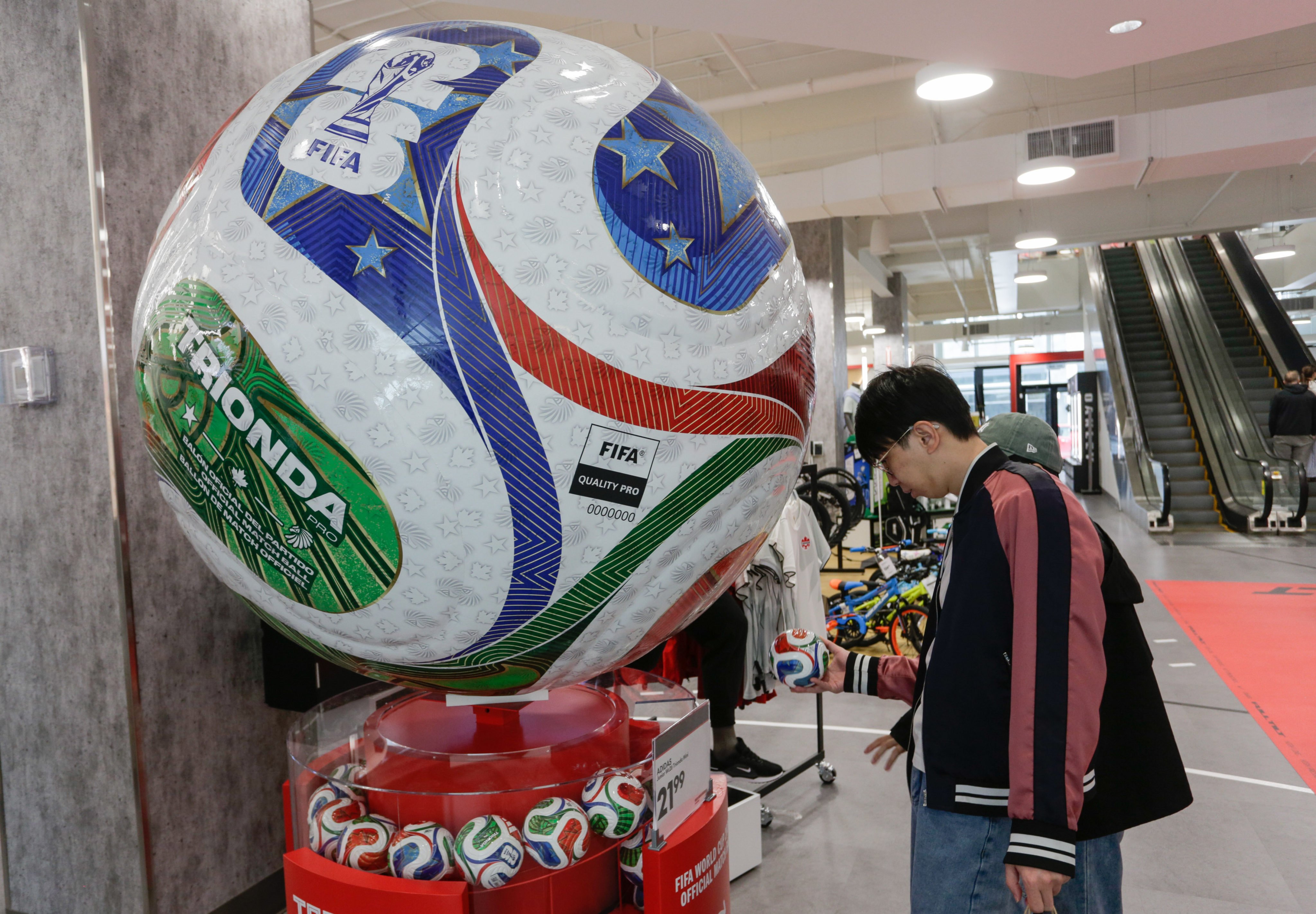 A giant replica of the official Fifa World Cup 2026 match ball is displayed inside a shop in Vancouver, Canada on Sunday. Photo: Xinhua
