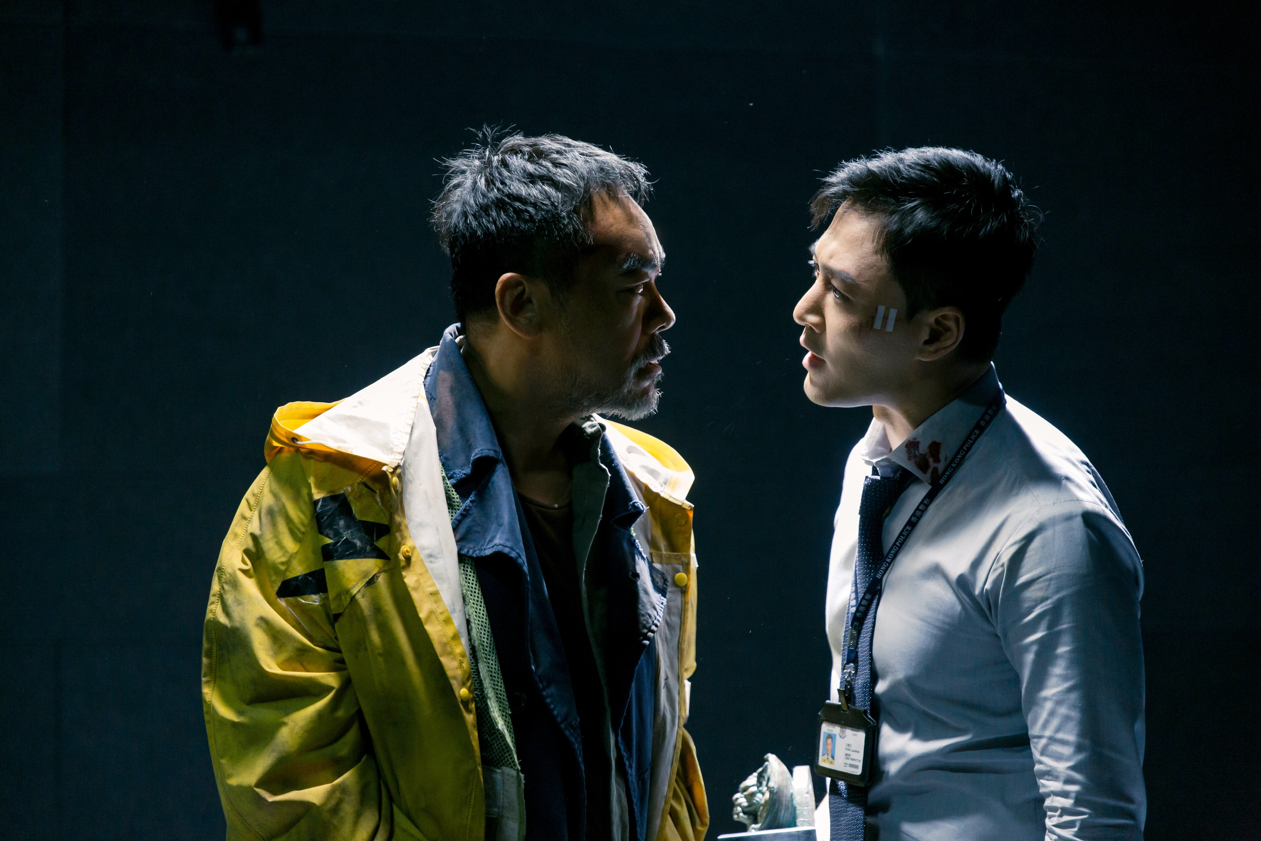 Lau Ching-wan (left) and Raymond Lam Fung in a still from Detective vs Sleuths.