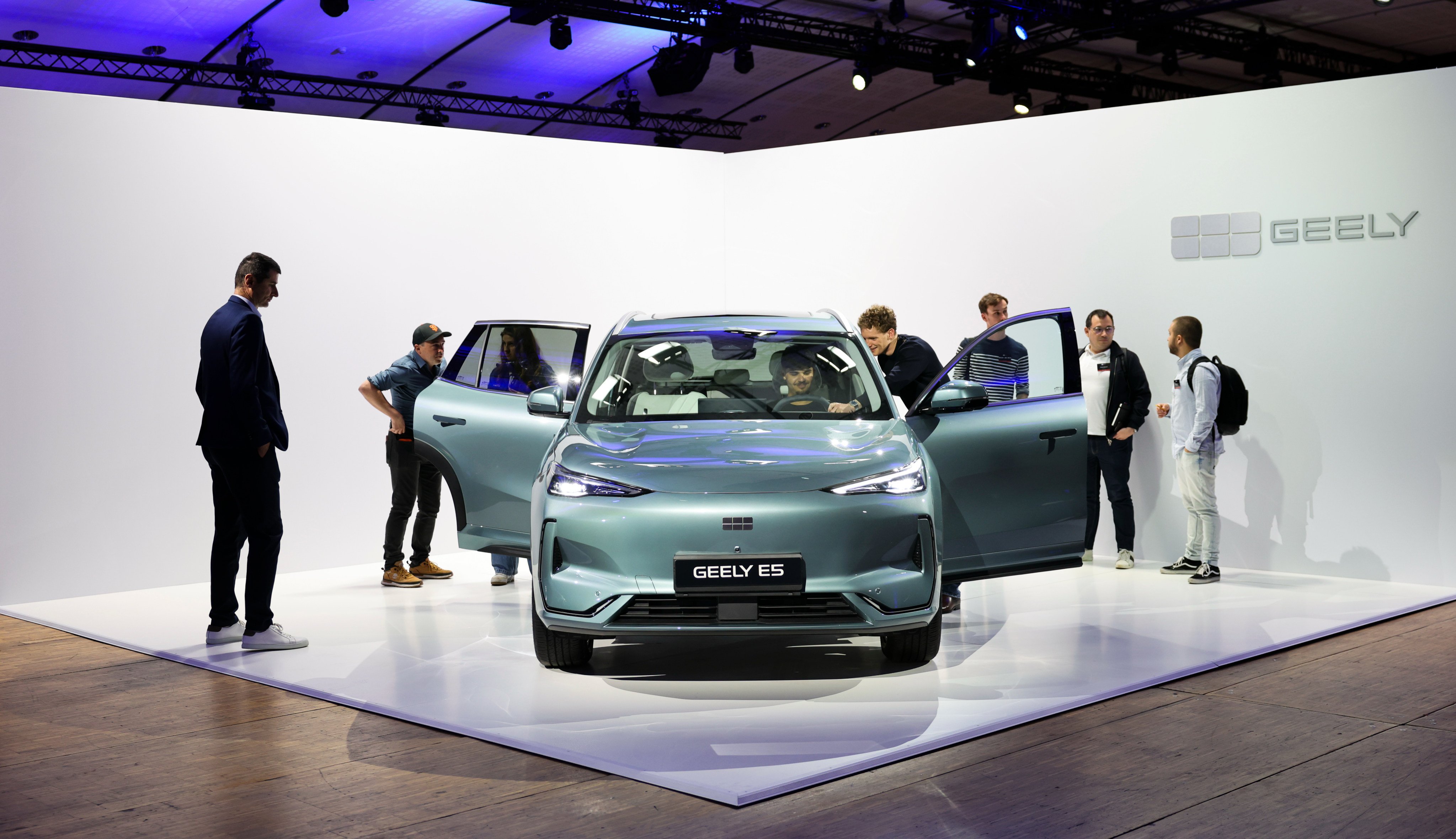 People view a Geely vehicle in Paris on Tuesday. Photo: Xinhua