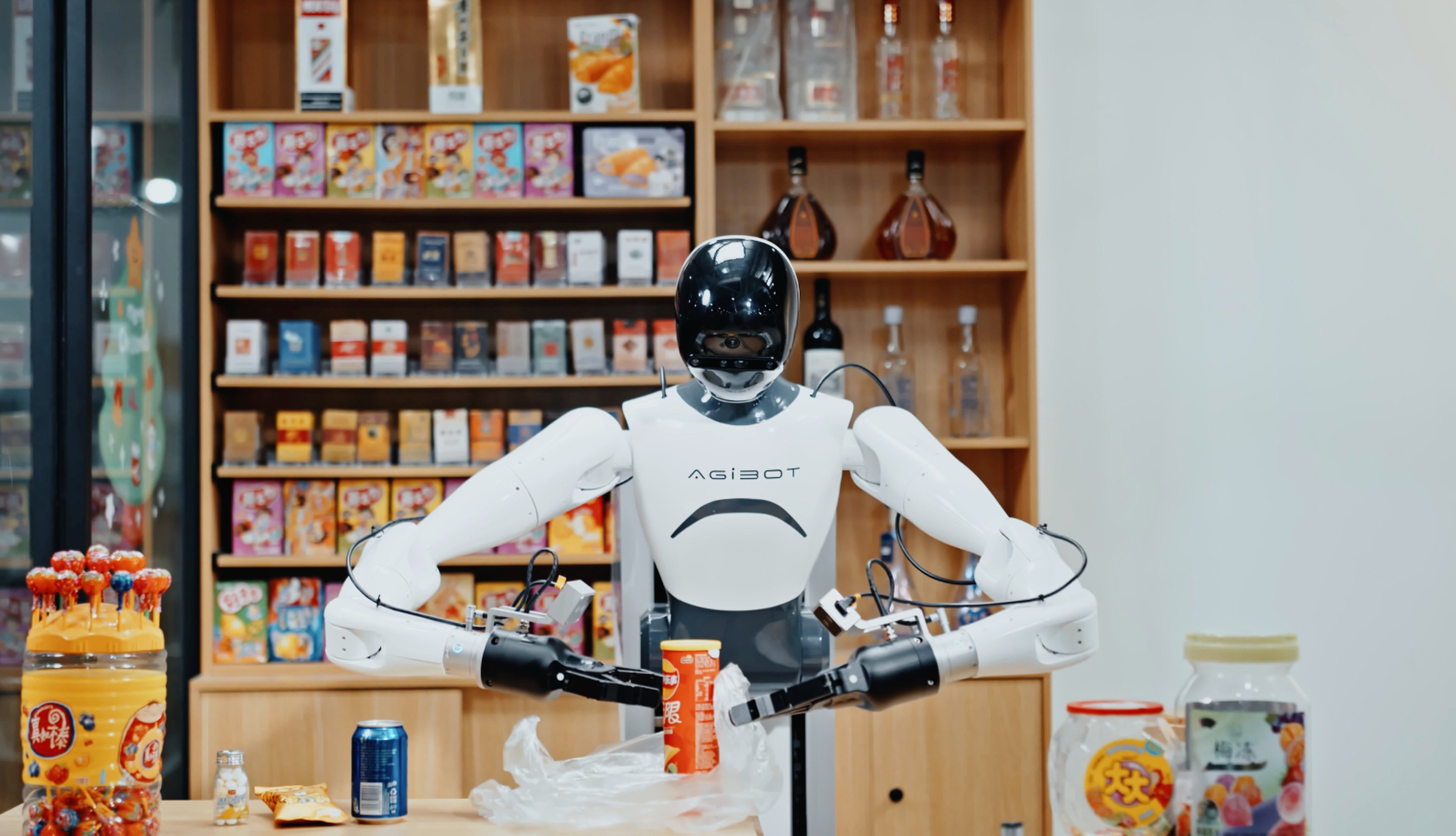 One of Agibot’s wheeled robots works at a supermarket checkout as the robotics sector reconsiders its business model to make the venture profitable. Photo: Handout