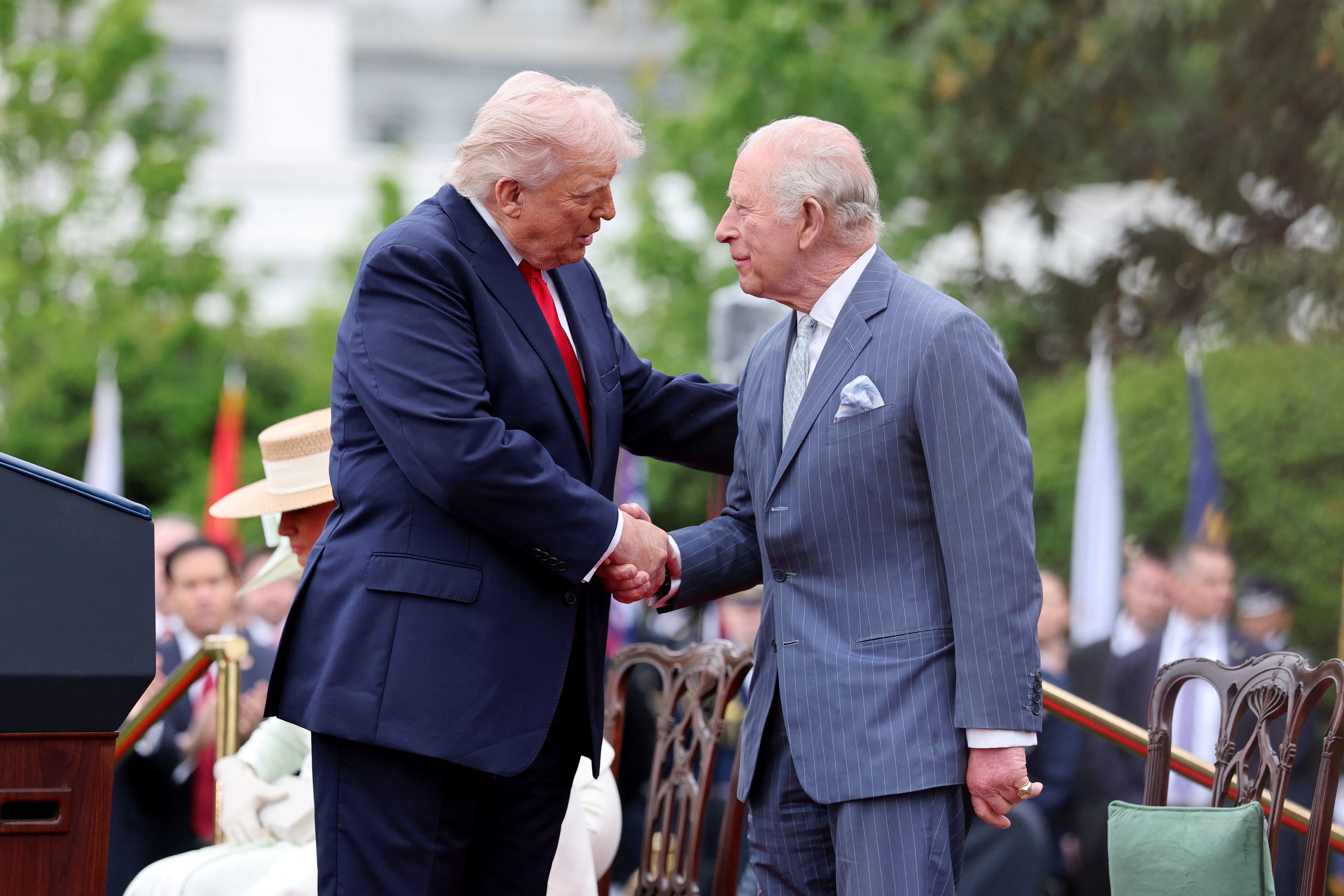 US President Donald Trump (left) and Britan’s King Charles shake hands during the State Arrival Ceremony on the South Lawn on Tuesday. Photo: Reuters
