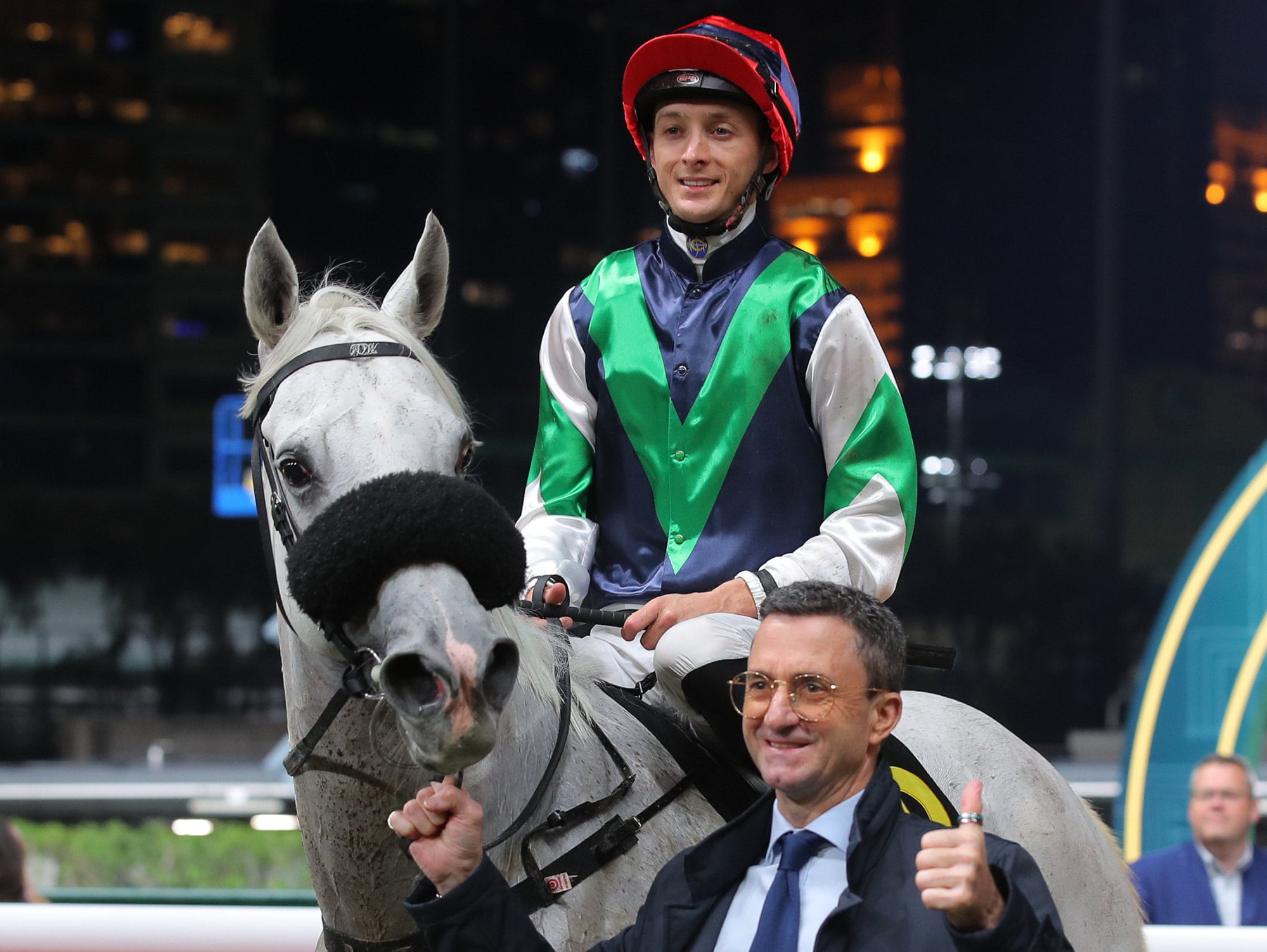 Gameplayer Elite, ridden by Harry Bentley, wins at Happy Valley for trainer Douglas Whyte.