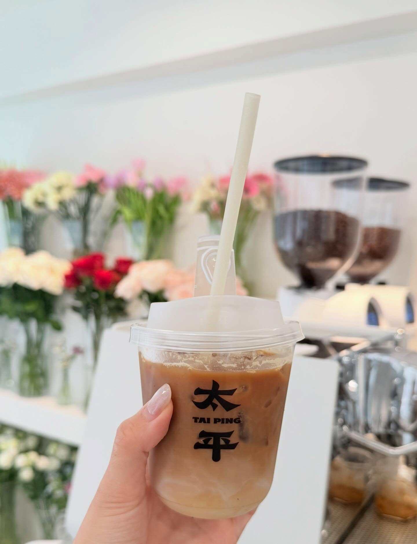 A coffee from Tai Ping, a new coffee shop on Sheung Wan’s Tai Ping Shan Street that doubles as a florist. It is one of five new cafes opening in May 2026 that offer something exciting for caffeine fans. Photo: Instagram/taiping.hk