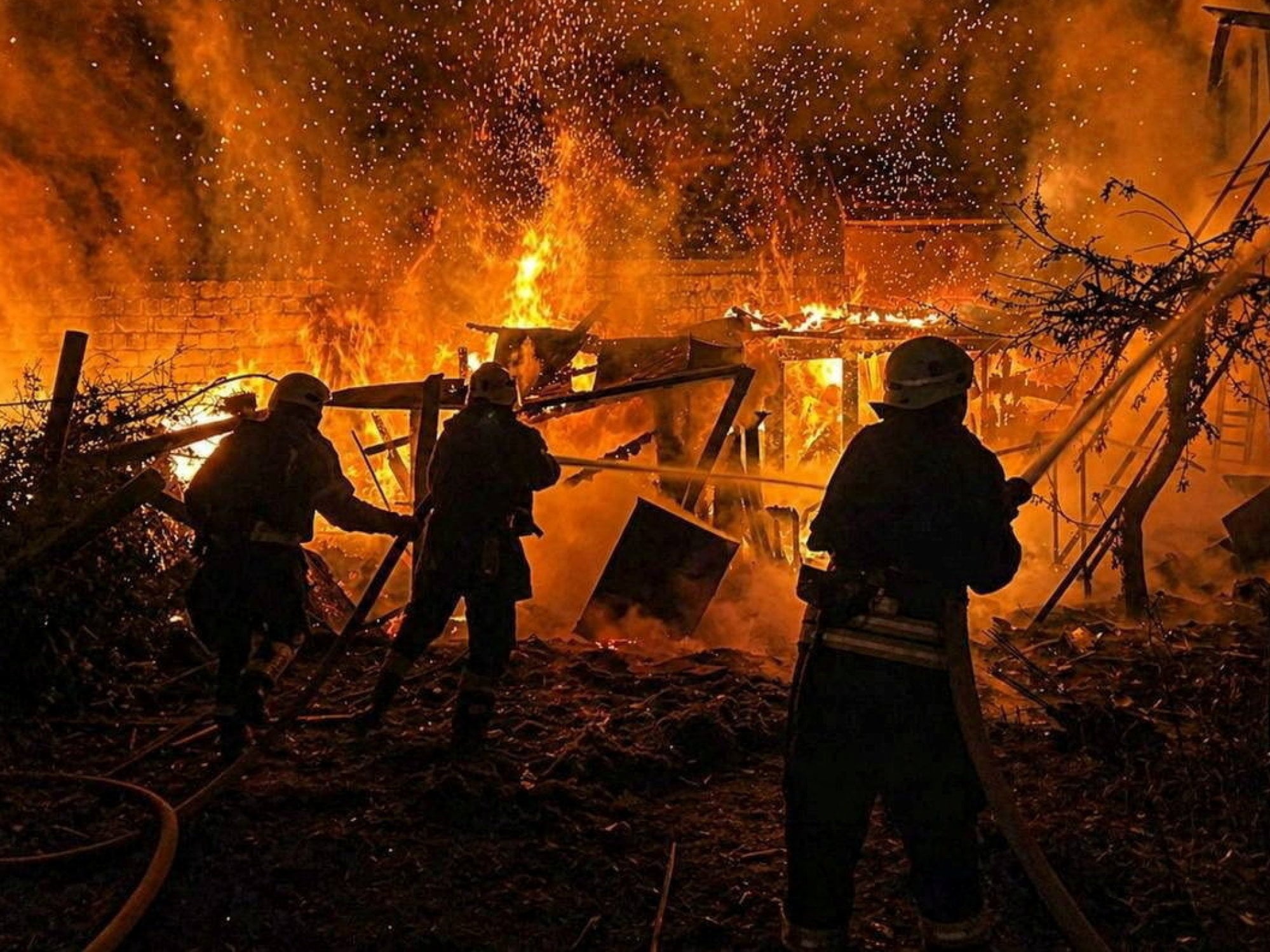 Firefighters at a site of a Russian drone strike in Ukraine’s Odesa region. Photo: State Emergency Service of Ukraine via Reuters