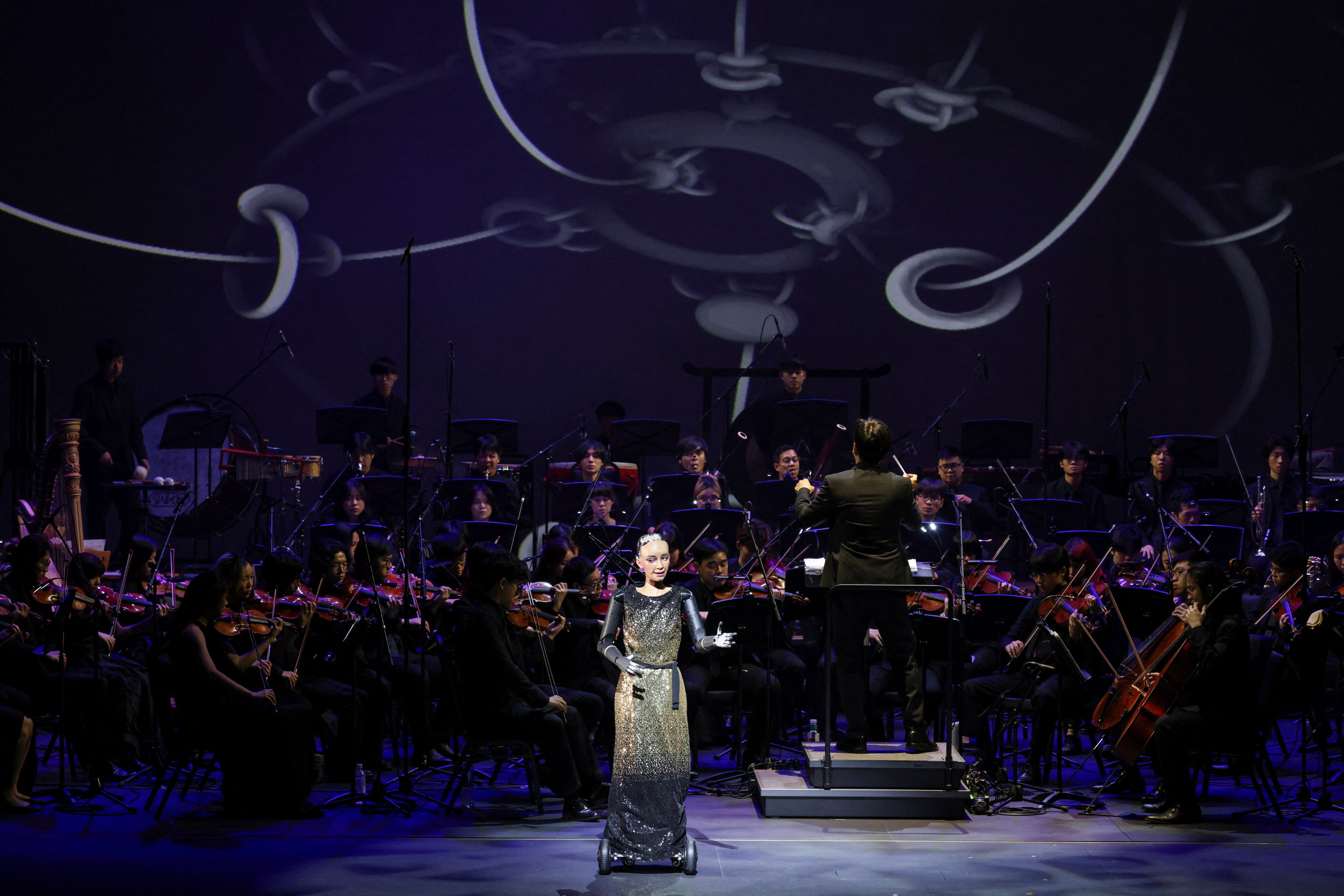 Humanoid robot Sophia performs during a rehearsal with the Hong Kong Baptist University (HKBU) Symphony Orchestra ahead of its 2026 Annual Gala Concert, in Hong Kong, China, April 29, 2026. REUTERS/Tyrone Siu