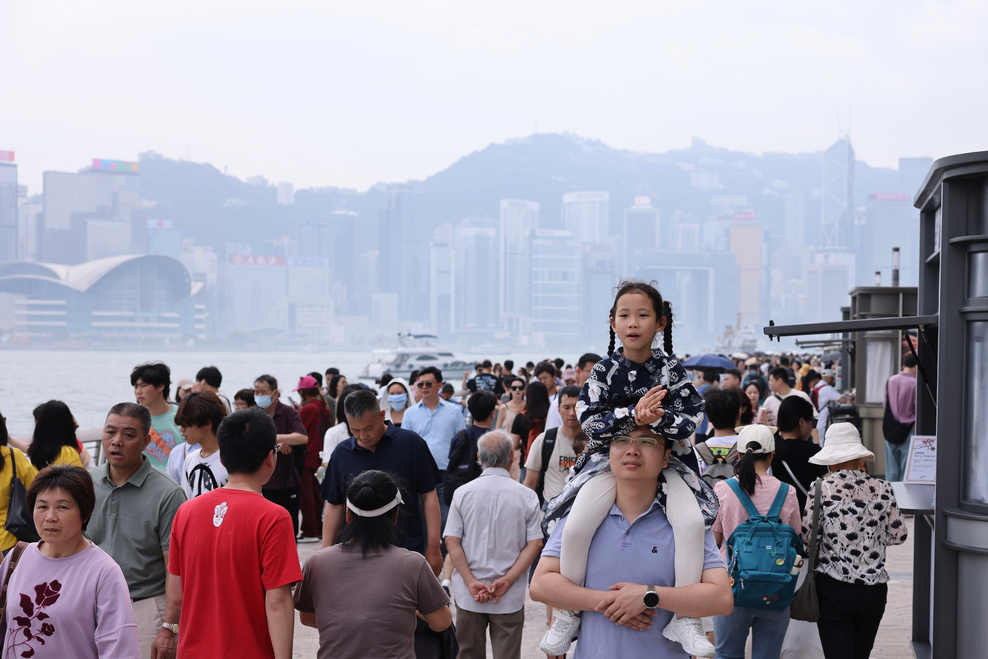 Mainland tourists flock to Tsim Sha Tsui during the Golden Week holiday on May 3, 2025. Photo: Nora Tam