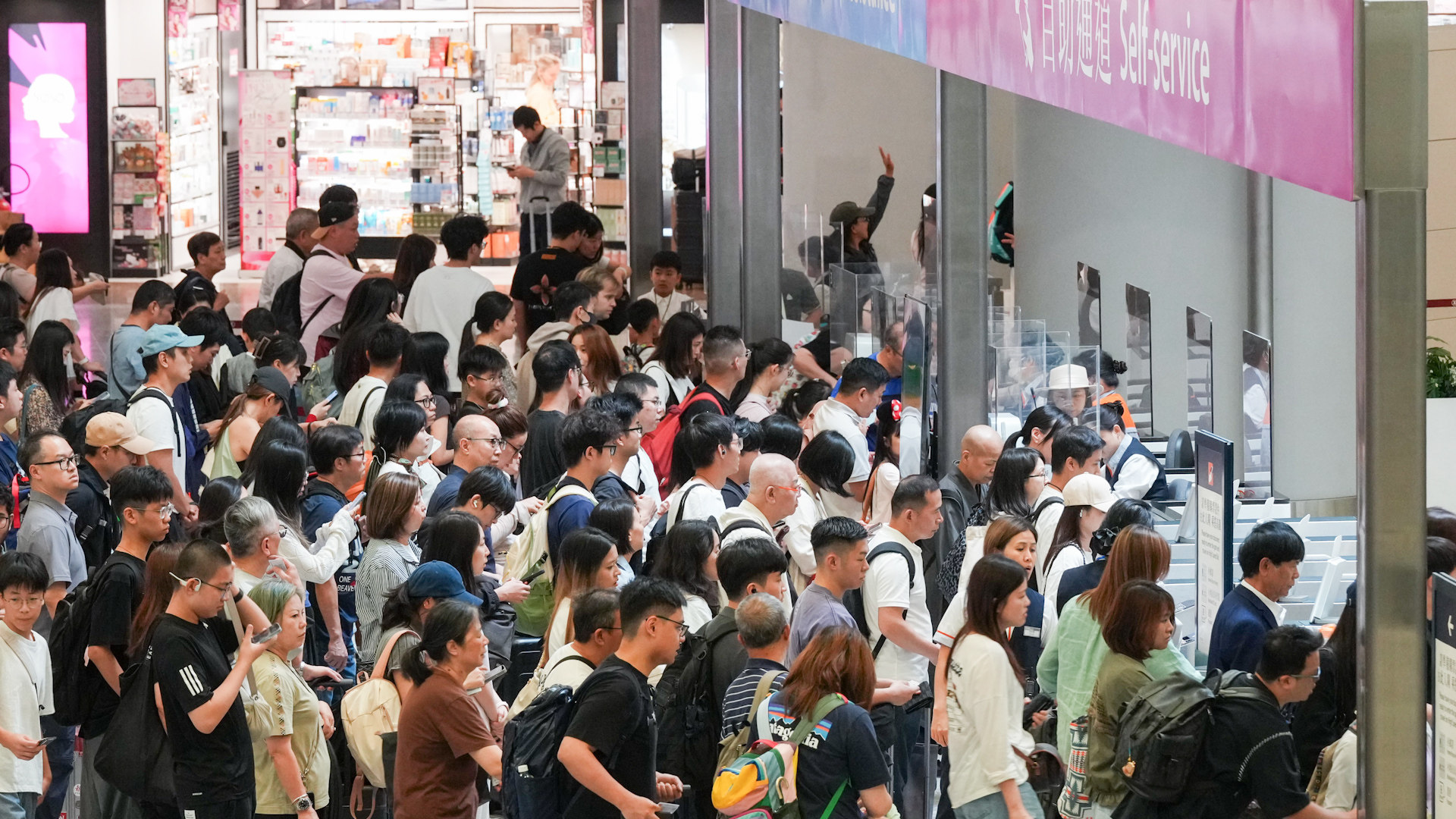 for video thumbnail - Hongkongers travel via high-speed rail from West Kowloon Station during the Labour Day holiday. 01MAY26 SCMP / Jelly Tse