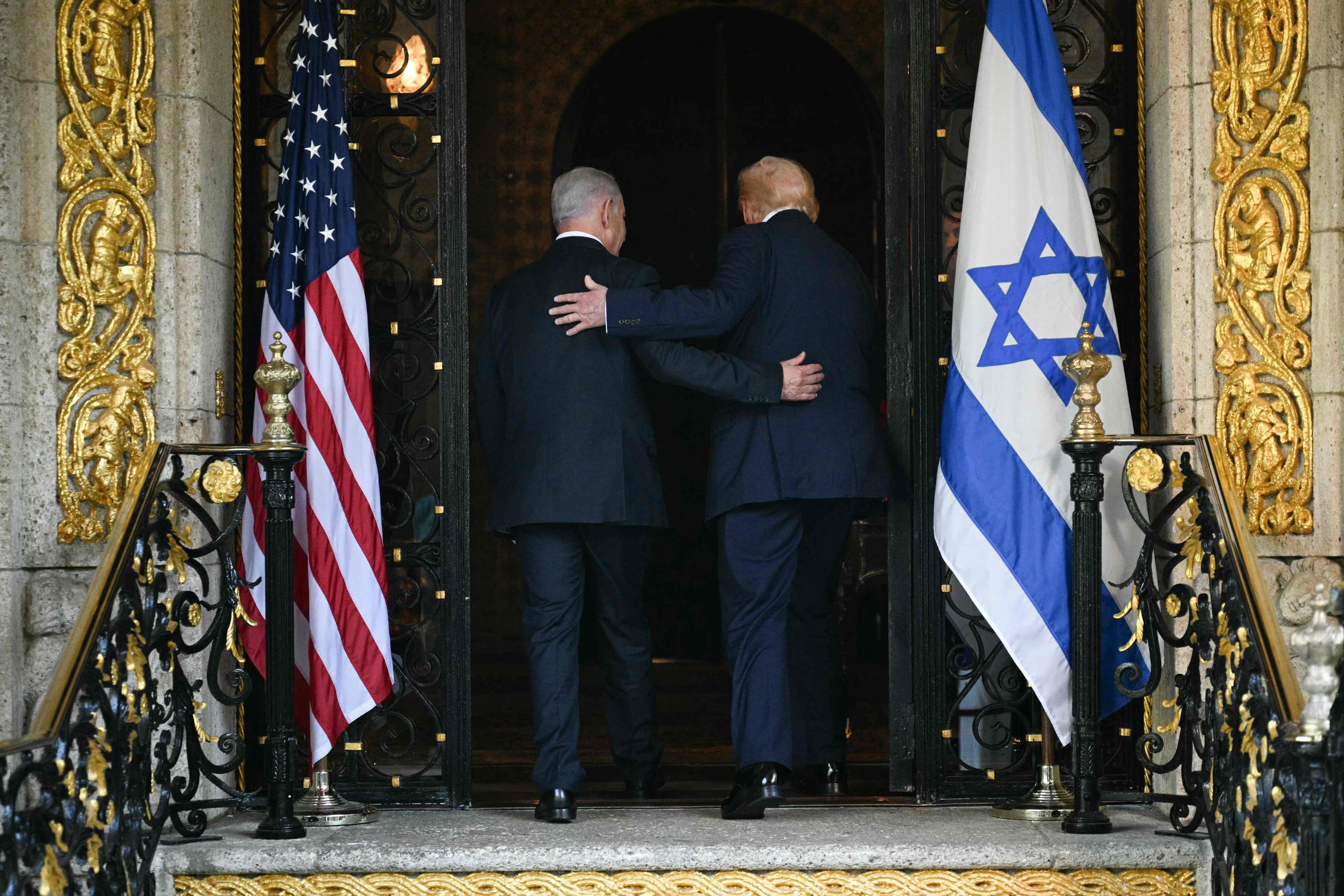 US President Donald Trump and Israeli Prime Minister Benjamin Netanyahu walk inside after Netanyahu arrives at Trump's Mar-a-Lago residence in Palm Beach, Florida on December 29, 2025. Photo: AFP