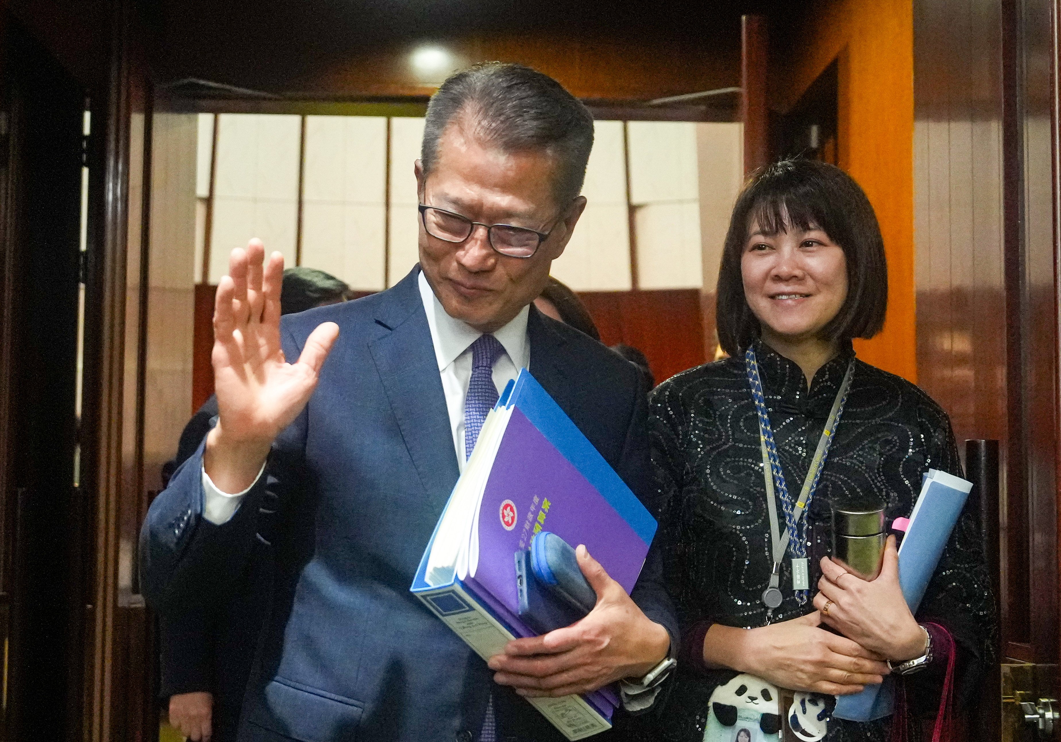 Financial Secretary Paul Chan leaves the chamber in the Legco Building after delivering his 2026-27 budget address on February 25. Photo: Sam Tsang