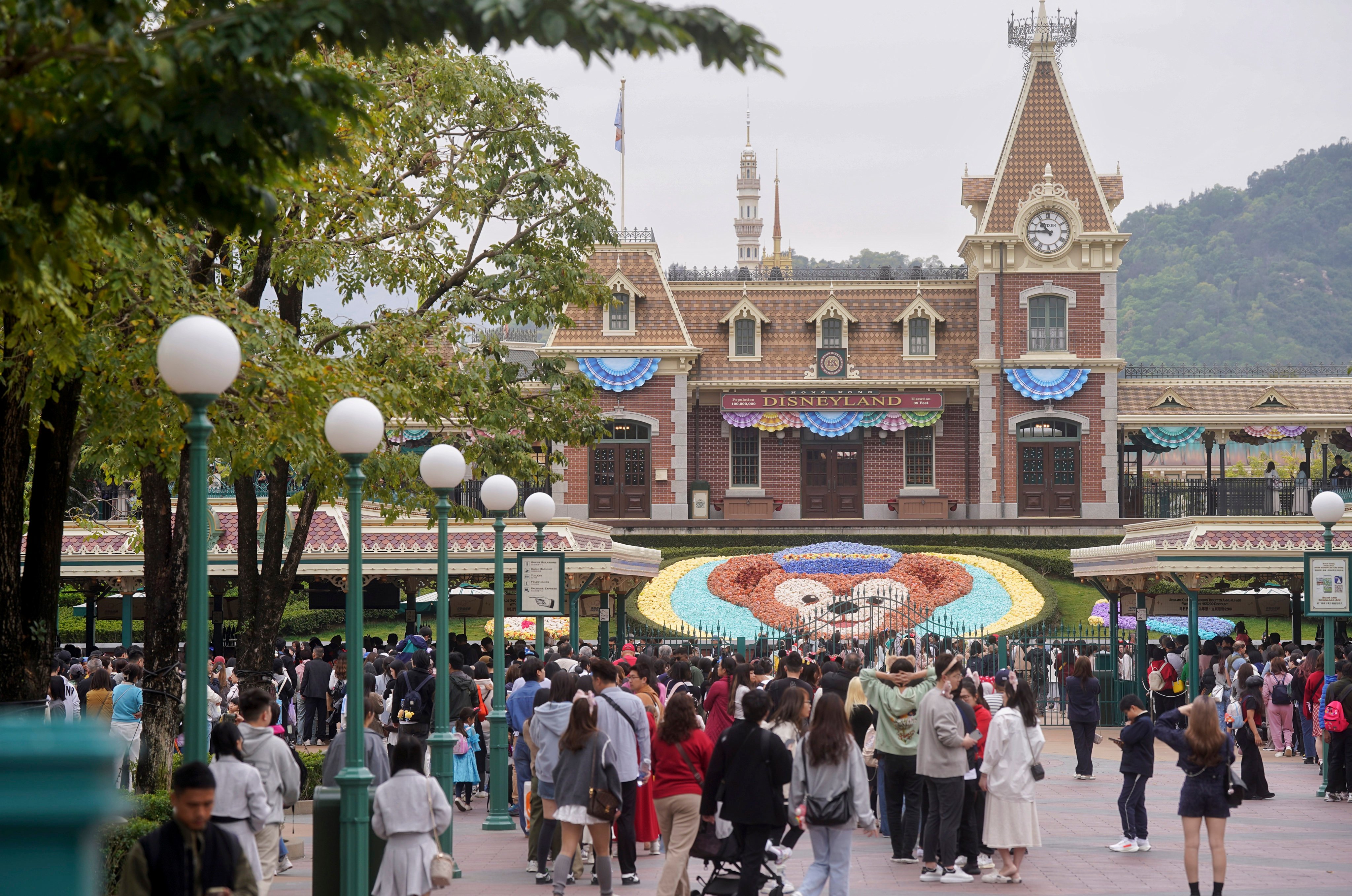 Visitors queue at the entrance to Hong Kong Disneyland in 2025. Photo: Elson Li