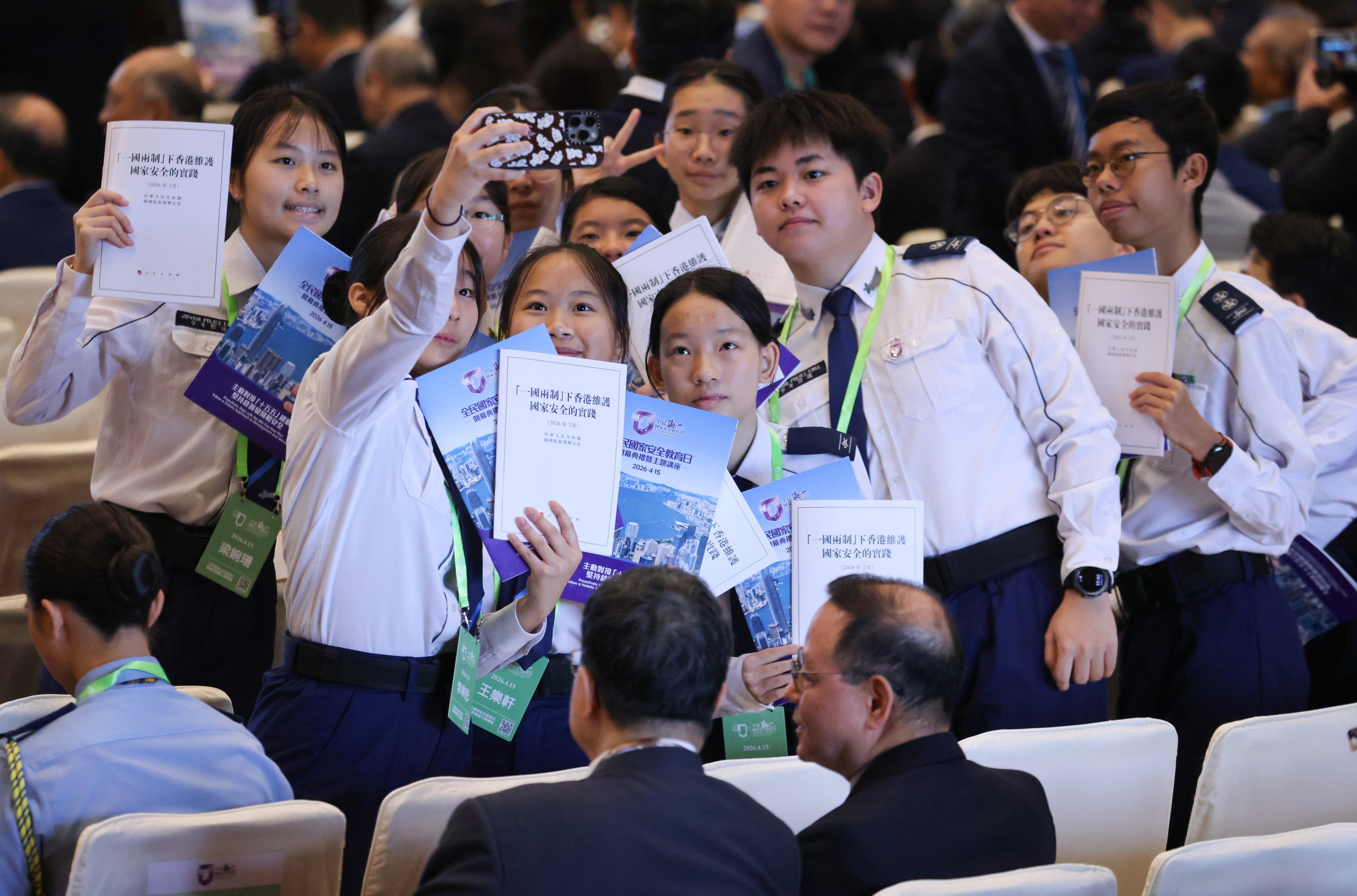 Students attend the opening ceremony of the National Security Education Day held at the Convention and Exhibition Centre in Wan Chai on April 15. Photo: Nora Tam