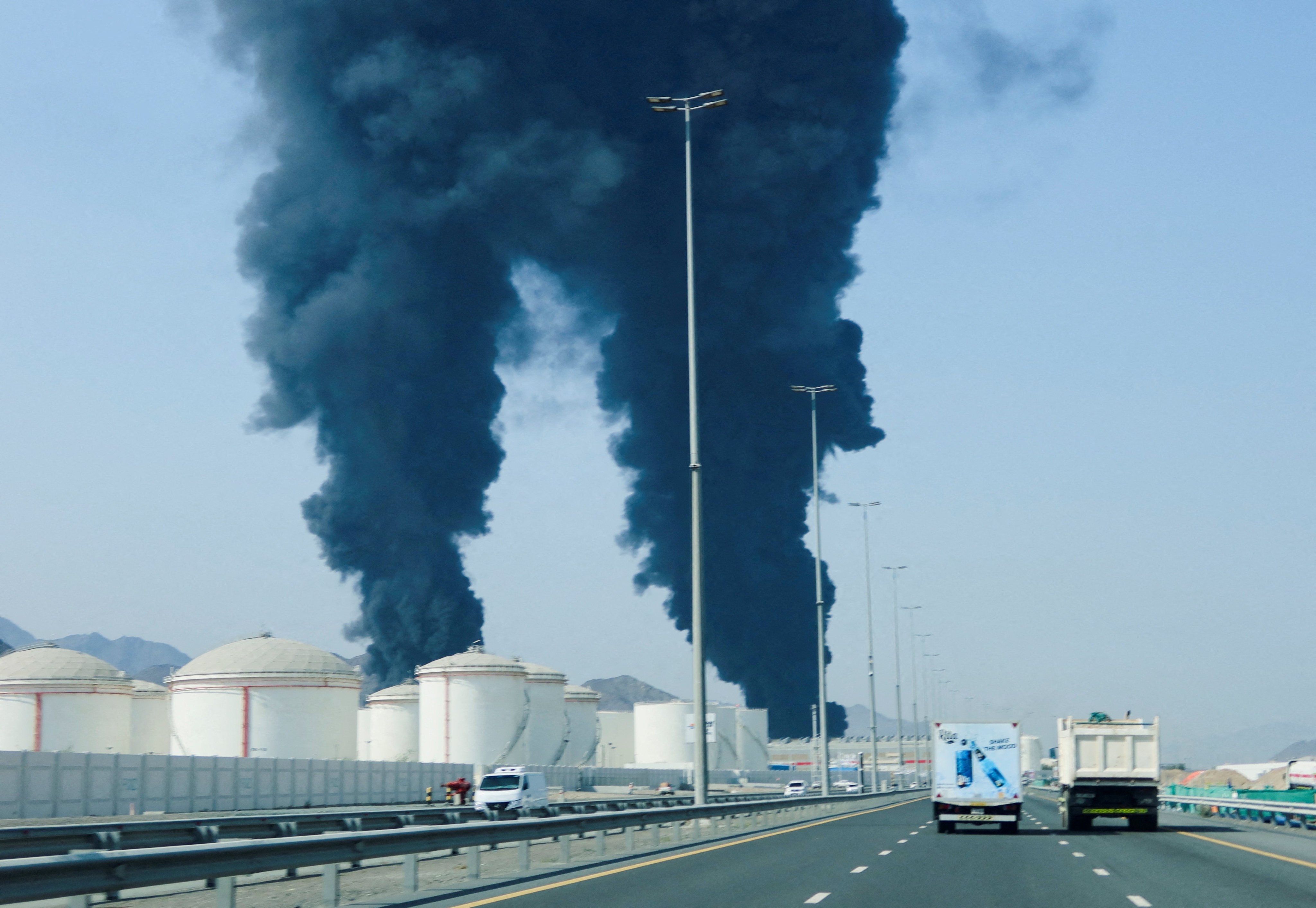 Smoke rises in the Fujairah oil industry zone, UAE, on March 14, following an interception of a drone amid the ongoing Middle East conflict. Photo: Reuters