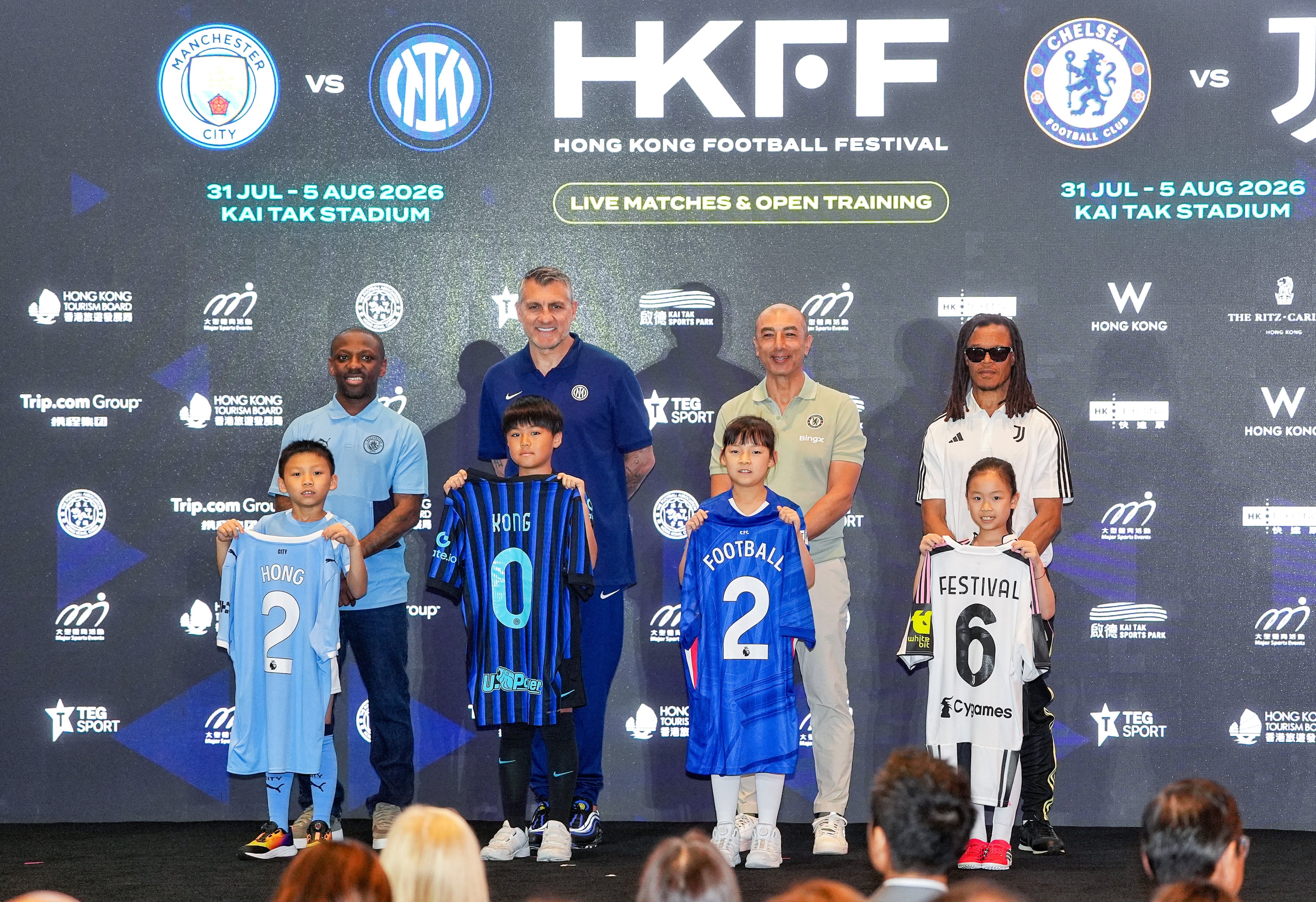 Shaun Wright-Phillips, Christian Vieri, Roberto Di Matteo and Edgar Davids (back row left to right) pose for pictures with little fans on stage during the press conference of Hong Kong Football Festival, on April 21, to be held in coming summer. Photo: Elson Li