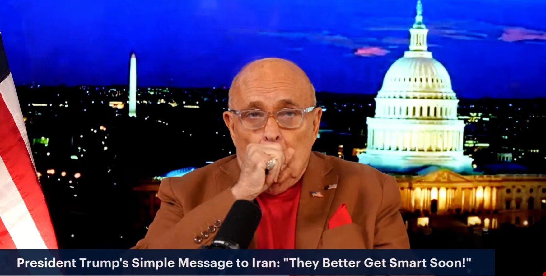 Rudy Giuliani coughs during his ‘America’s Mayor Live’ broadcast on Friday. Photo: @RudyWGiuliani via YouTube