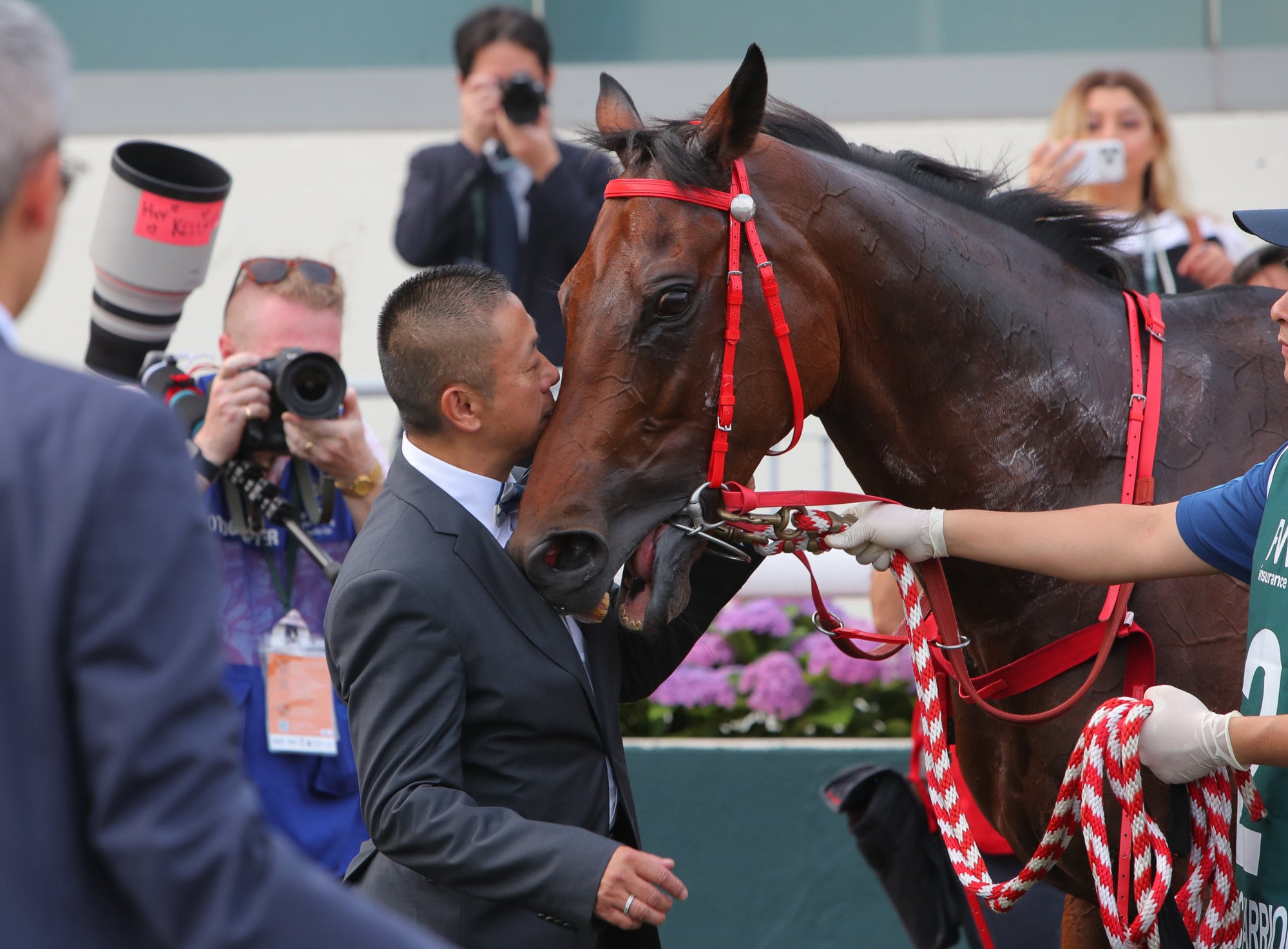 Danny Shum with Romantic Warrior after his fourth QEII Cup victory.