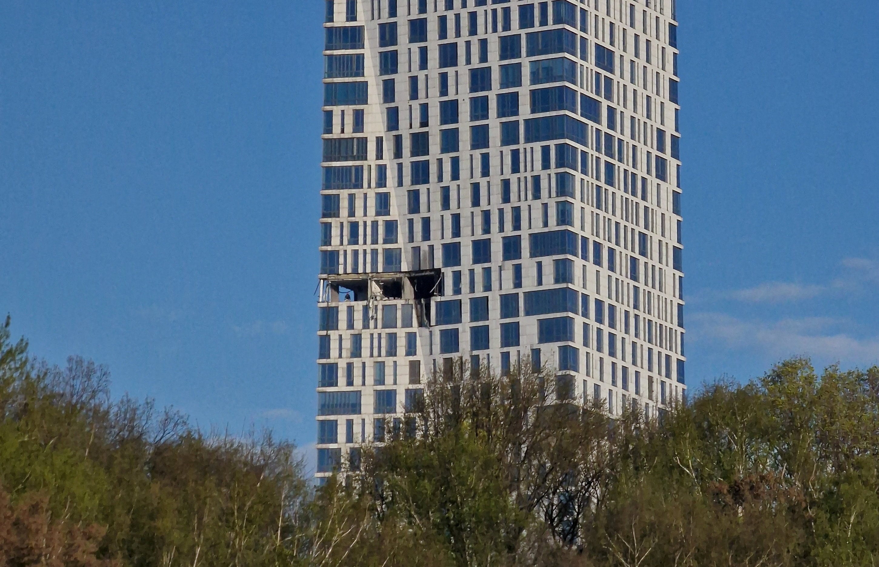The damaged facade of the high-rise Moscow building following the drone attack. Photo: Reuters