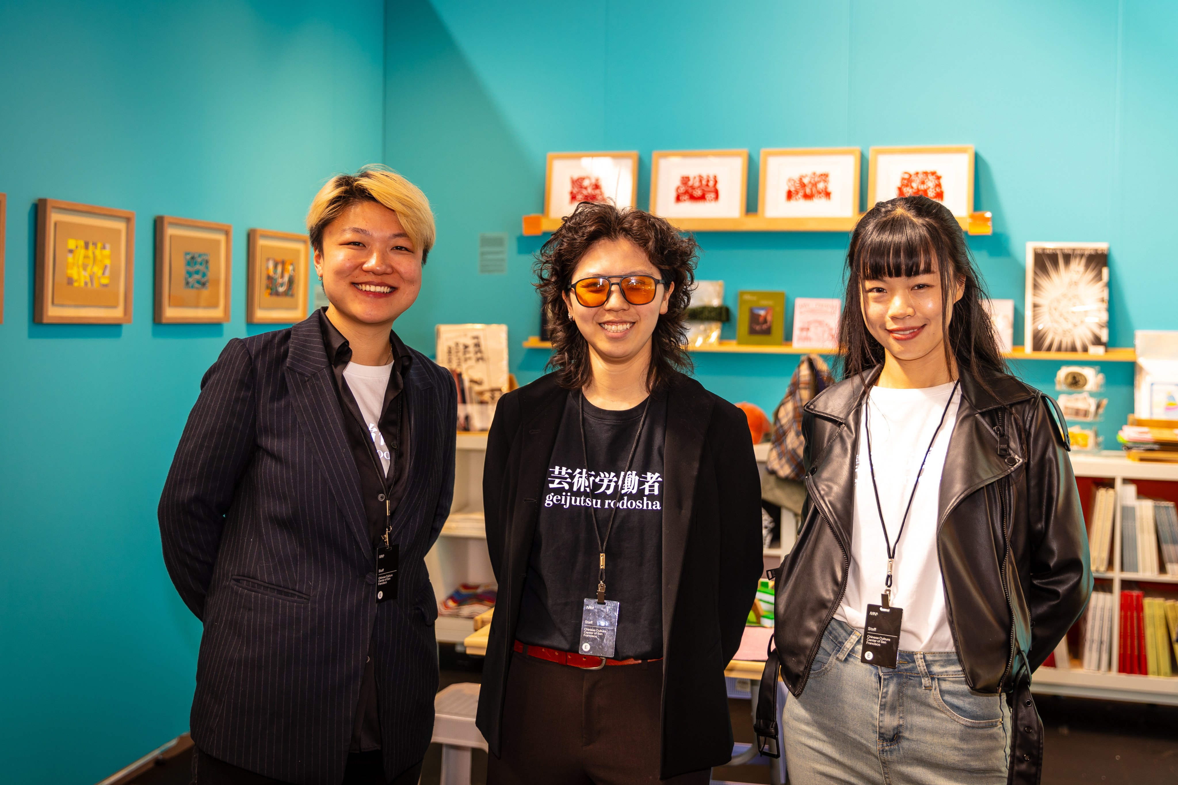 Curator Hoi Leung (middle) photographed at the San Francisco Art Fair 2026 with colleagues from the Chinese Culture Center of San Francisco, Yuanyuan Zhu (left) and Kyan Ng (right). (Photo by Hunter Ridenour, courtesy of AMP)