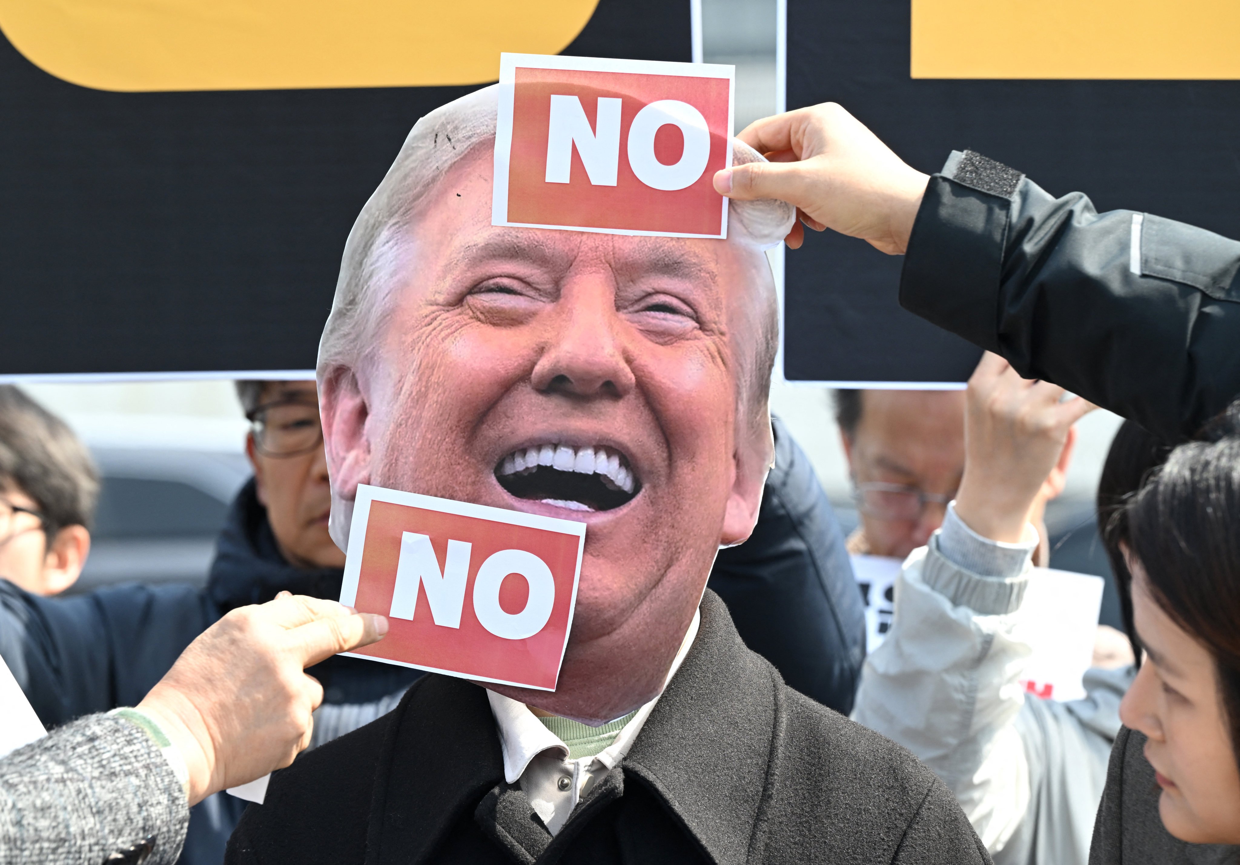 South Koreans protest in Seoul last month against an earlier request by US President Donald Trump to dispatch warships to the Strait of Hormuz. Photo: AFP