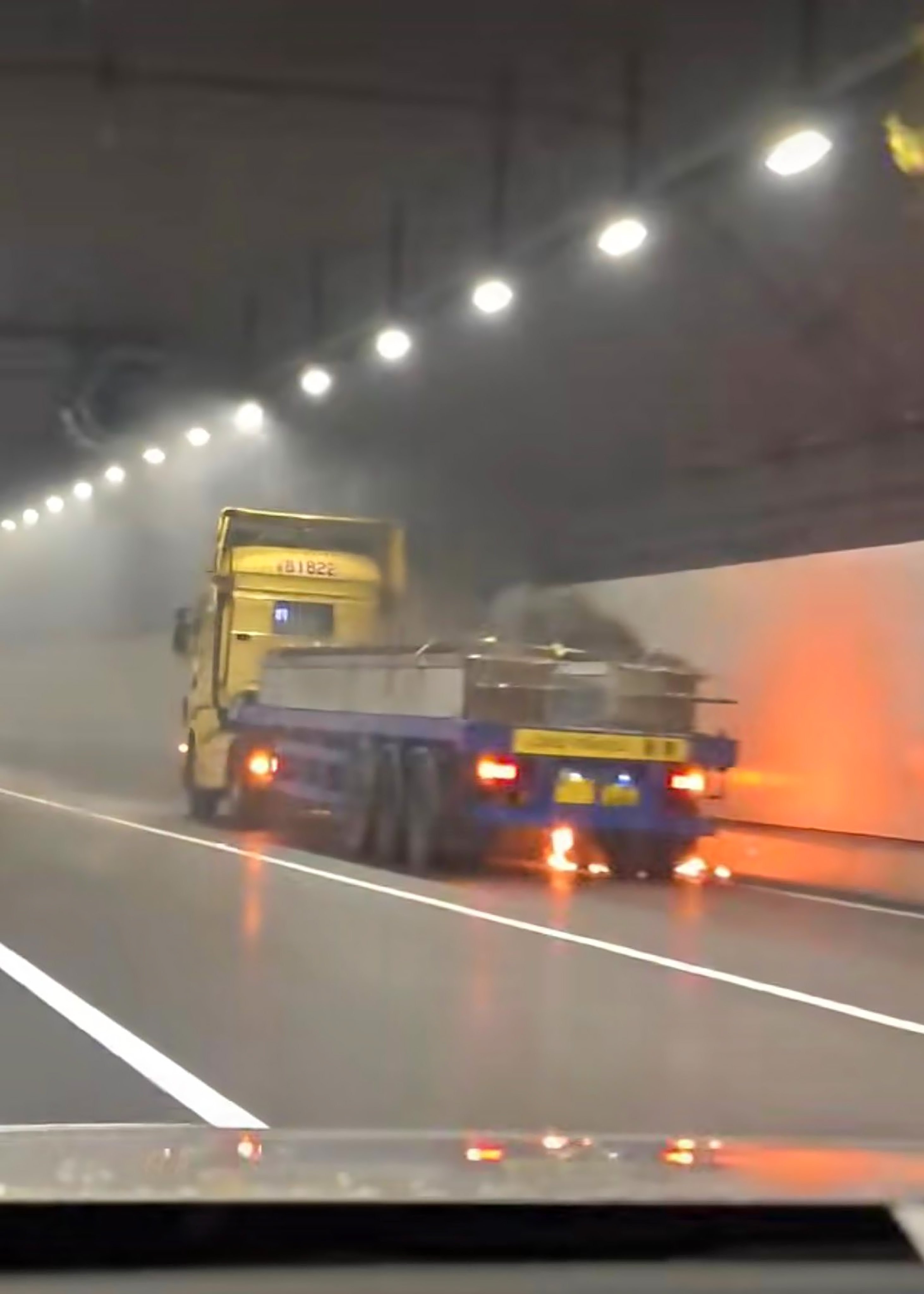 The truck catches fire inside the undersea section of the Hong Kong-Zhuhai-Macau Bridge. Photo: Facebook