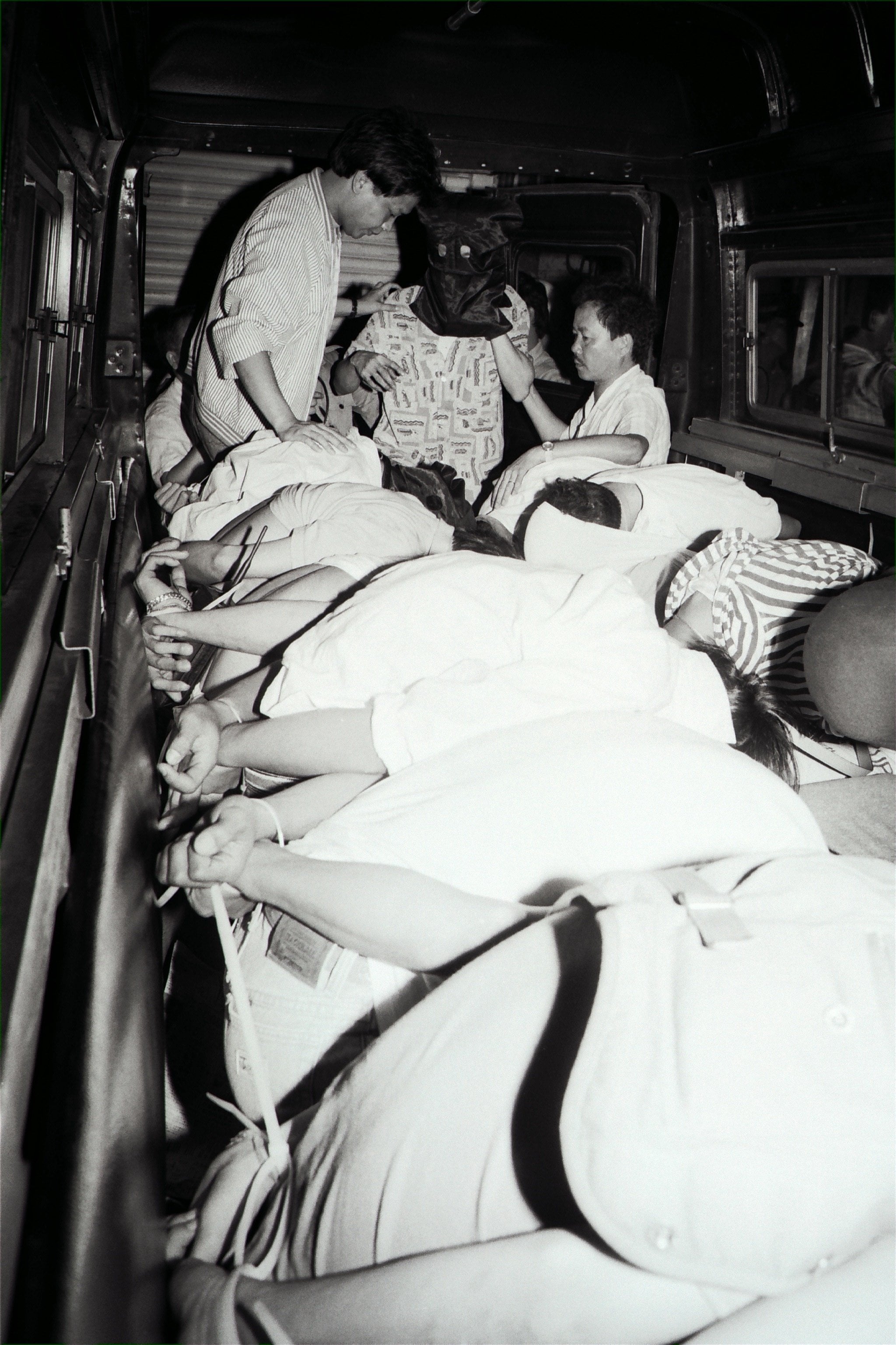 Police load suspected Sun Yee On members into a police van following a raid during an initiation ceremony of the triad society in Hong Kong in 1990. Photo: SCMP