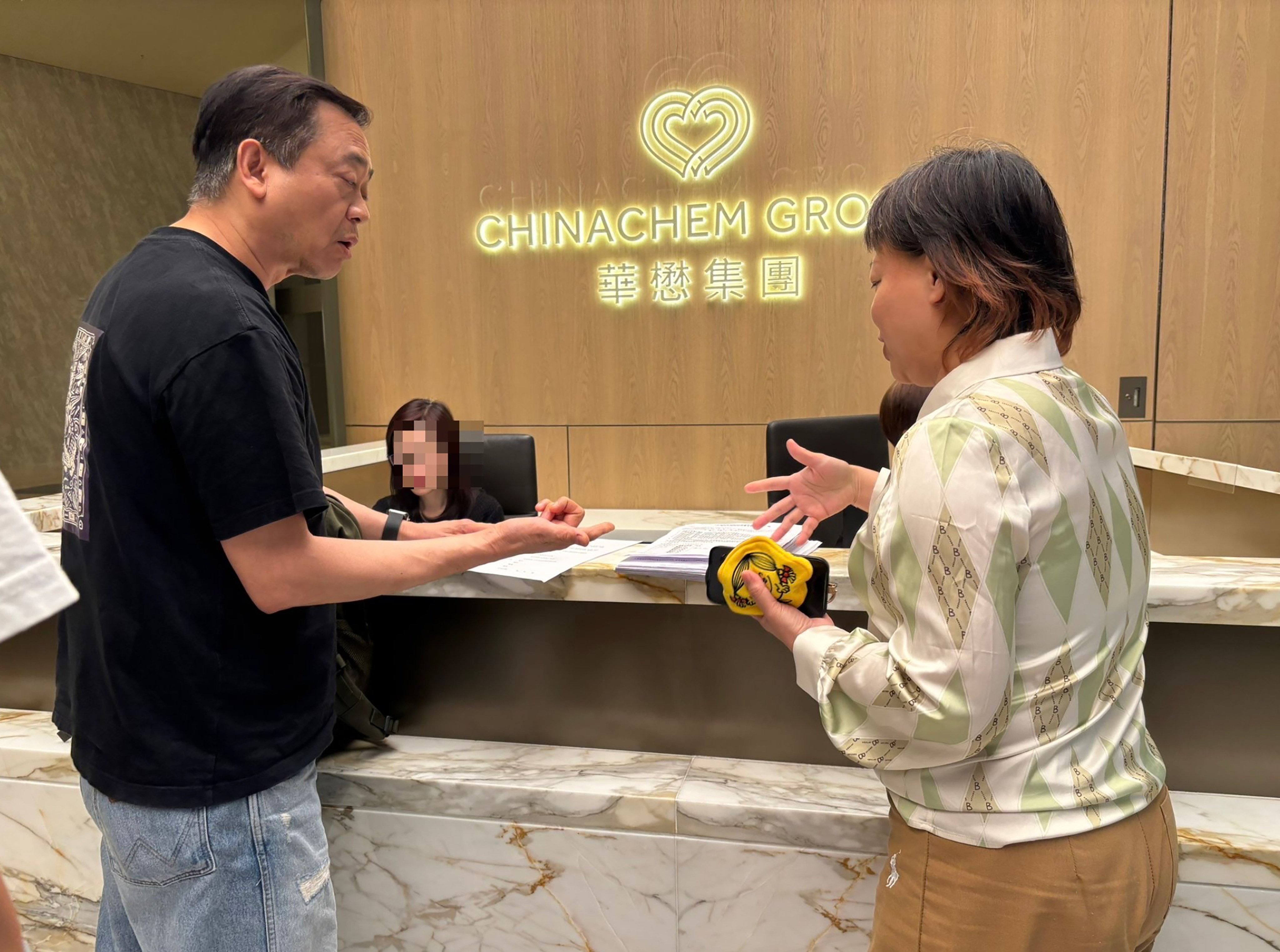 A Wang Fuk Court homeowner submits the petition to Hop On Management Company on April 29. Photo: Handout