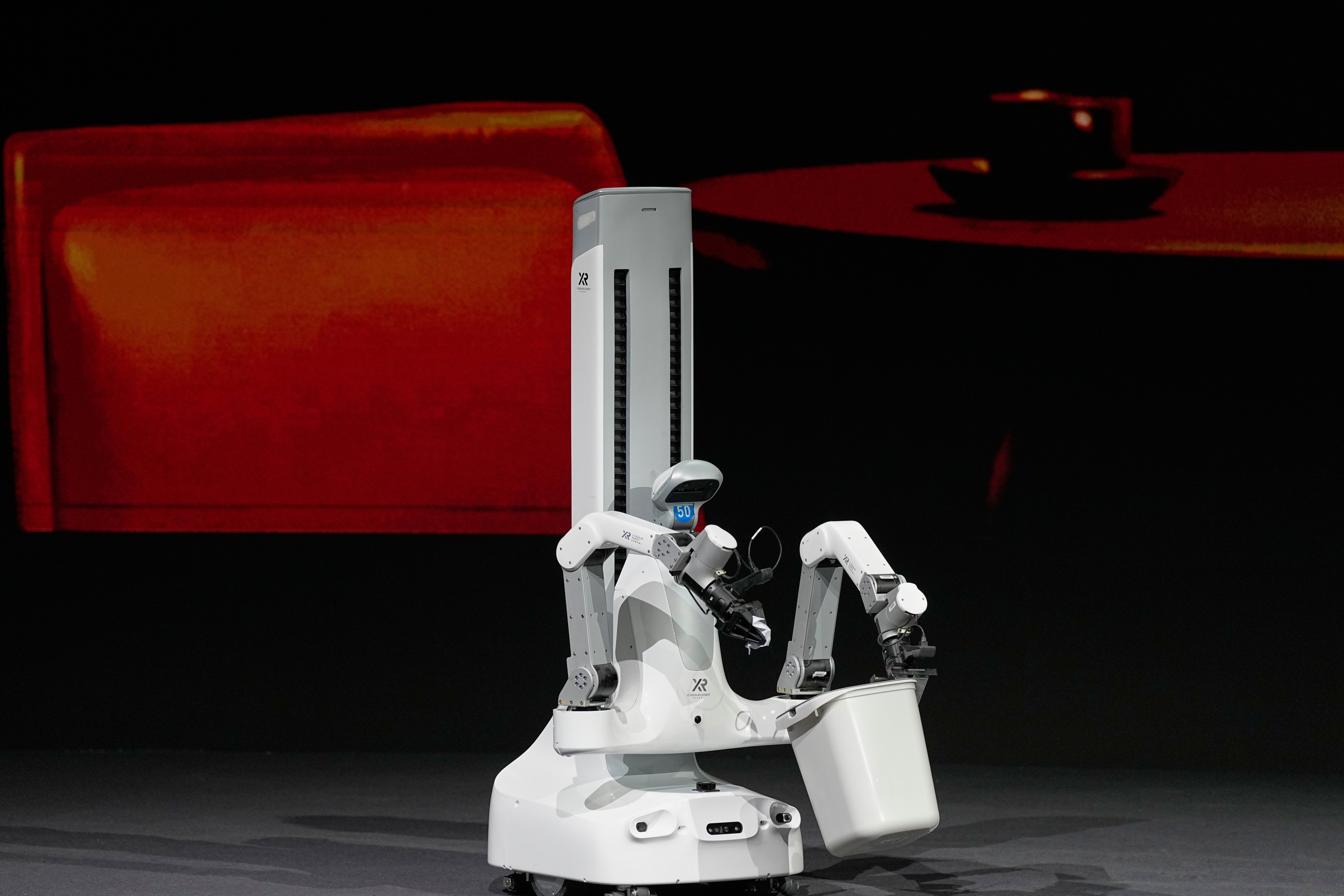 An X Square Robot that is capable of picking up rubbish in Beijing on April 21. Photo: AP Photo