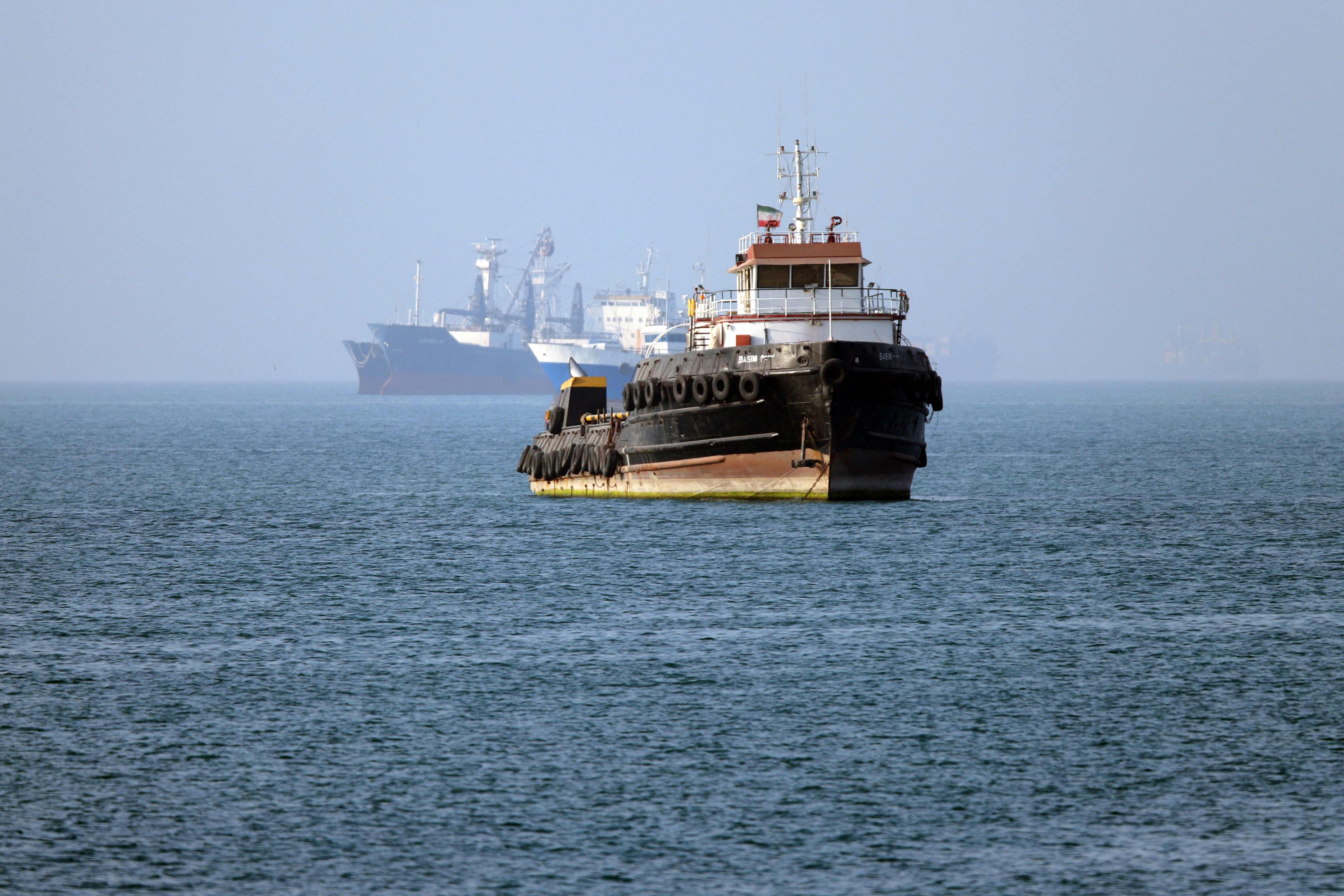 An Iran-flagged tugboat sails off Bandar Abbas on Monday. Photo: AFP