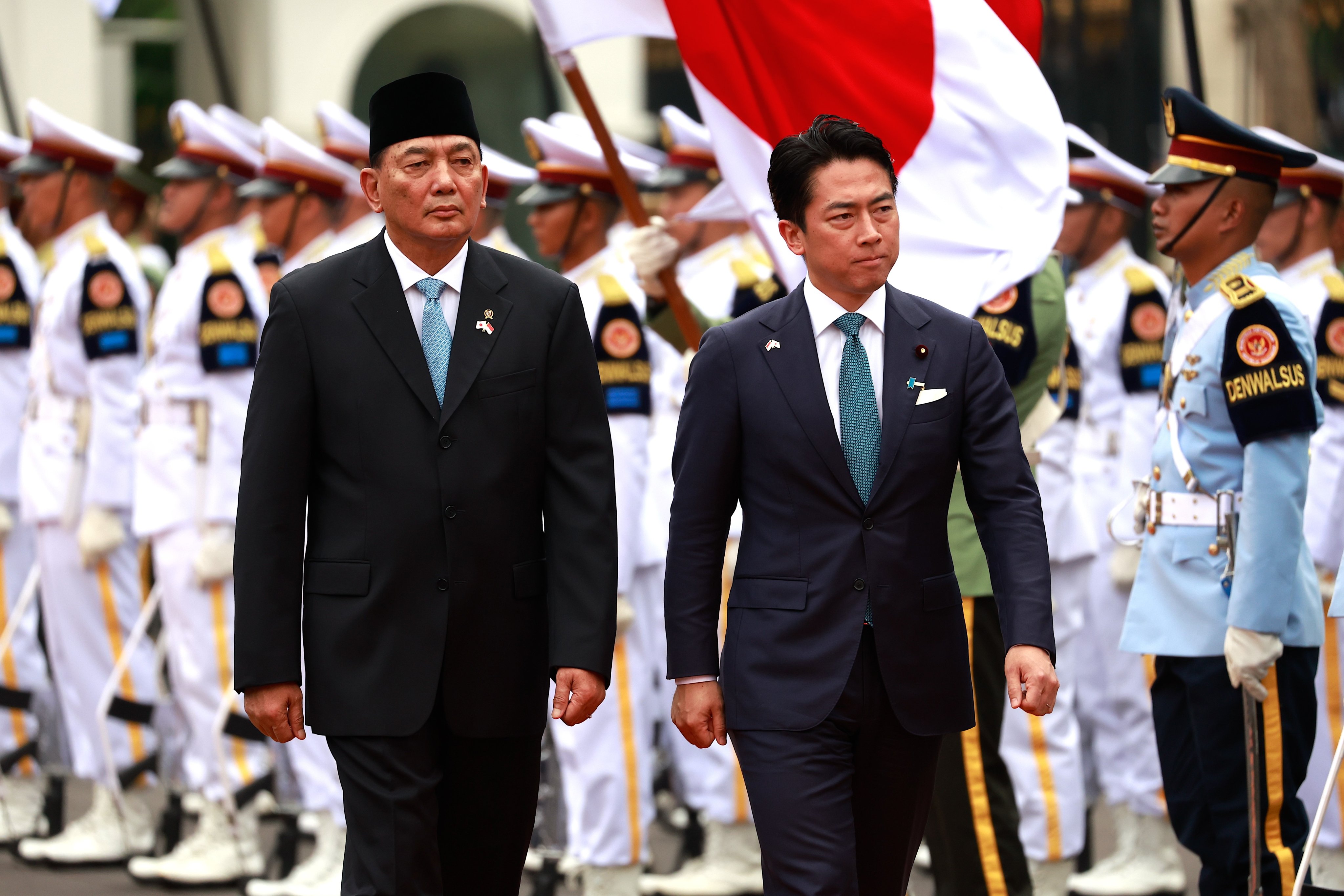 Japan’s Defence Minister Shinjiro Koizumi and his Indonesian counterpart Sjafrie Sjamsoeddin inspect an honour guard before their meeting in Jakarta on Monday. Photo: EPA