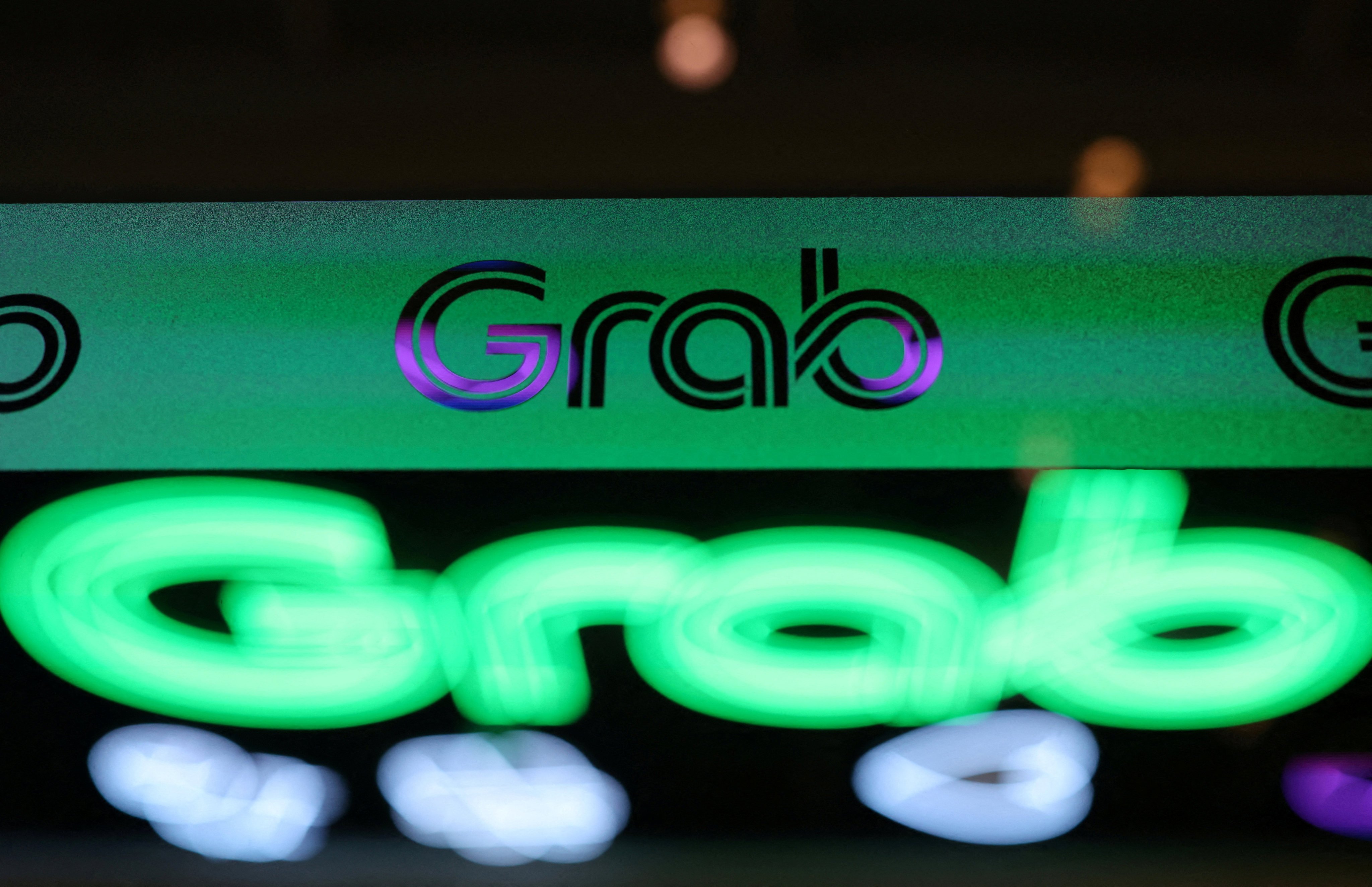 A Grab signage is seen at its office in Singapore on February 25. Photo: Reuters