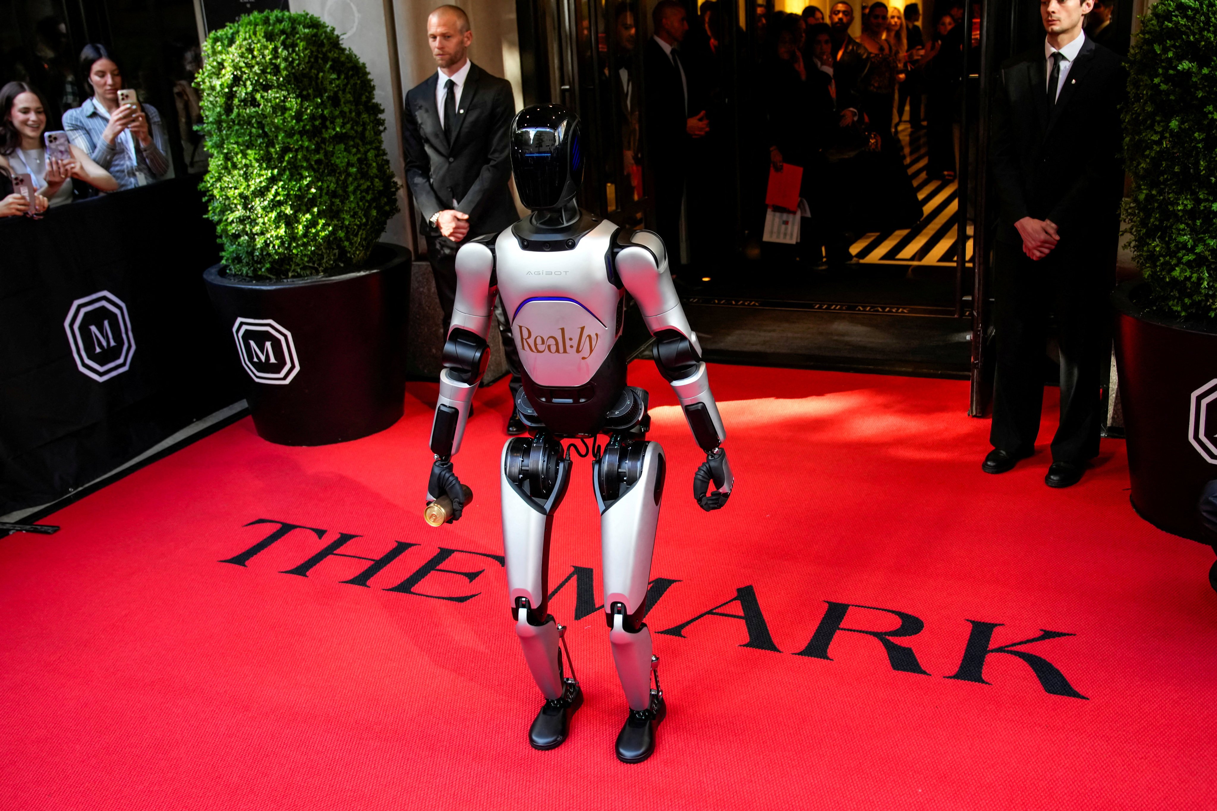 An Alexander Wang robot departs Mark Hotel, during the Met Gala, an annual fundraising gala held for the benefit of the Metropolitan Museum of Art's Costume Institute with this year's theme 'Costume Art' in New York City, New York, U.S., May 4, 2026. REUTERS/Eduardo Munoz     TPX IMAGES OF THE DAY