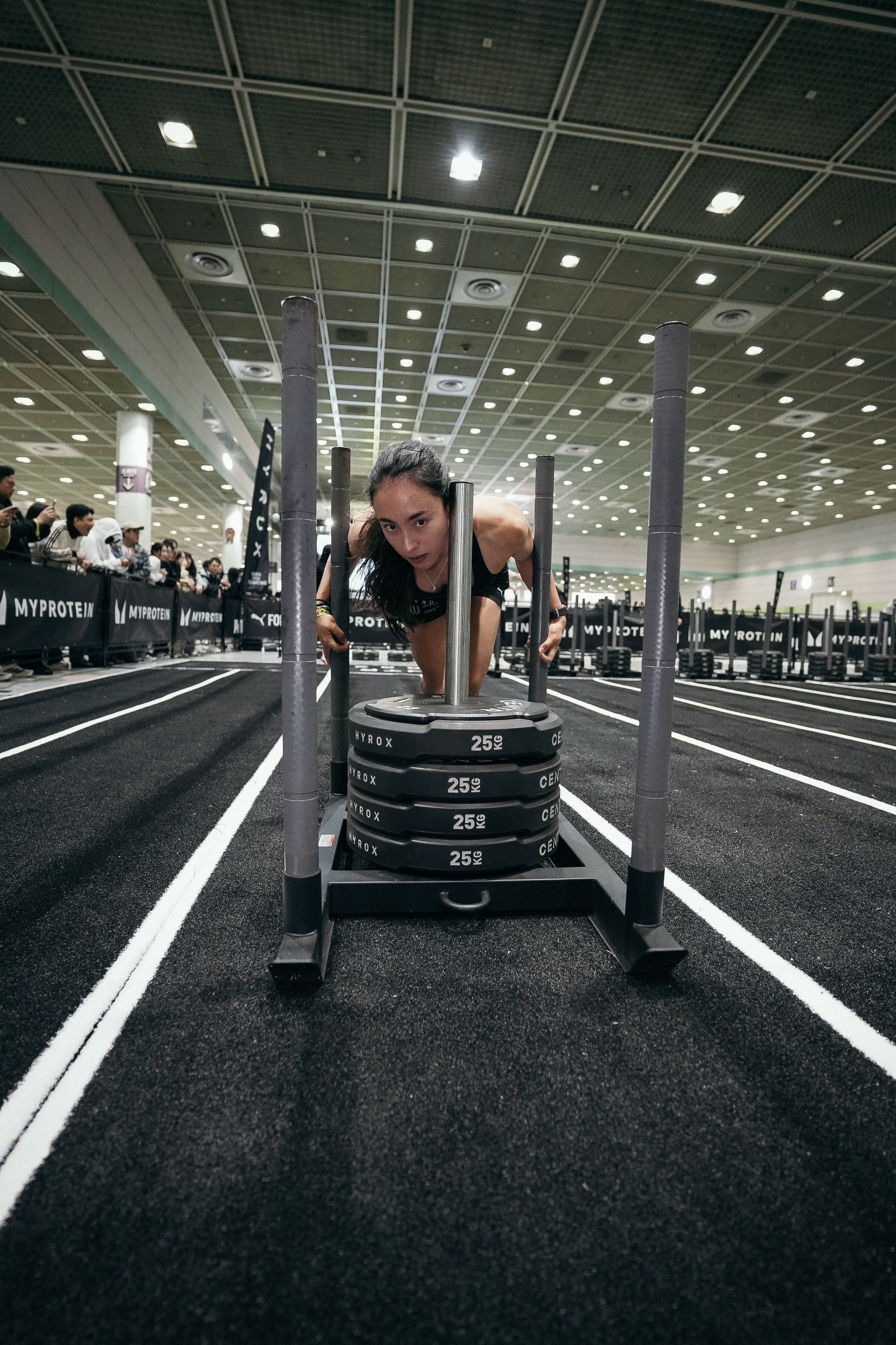 Claire Nesbitt pushes a sled in the Hyrox Pro Women race in Seoul, South Korea, in November 2025. She is one of Asia’s fastest Hyrox athletes and a full-time coach. Photo: Claire Nesbitt