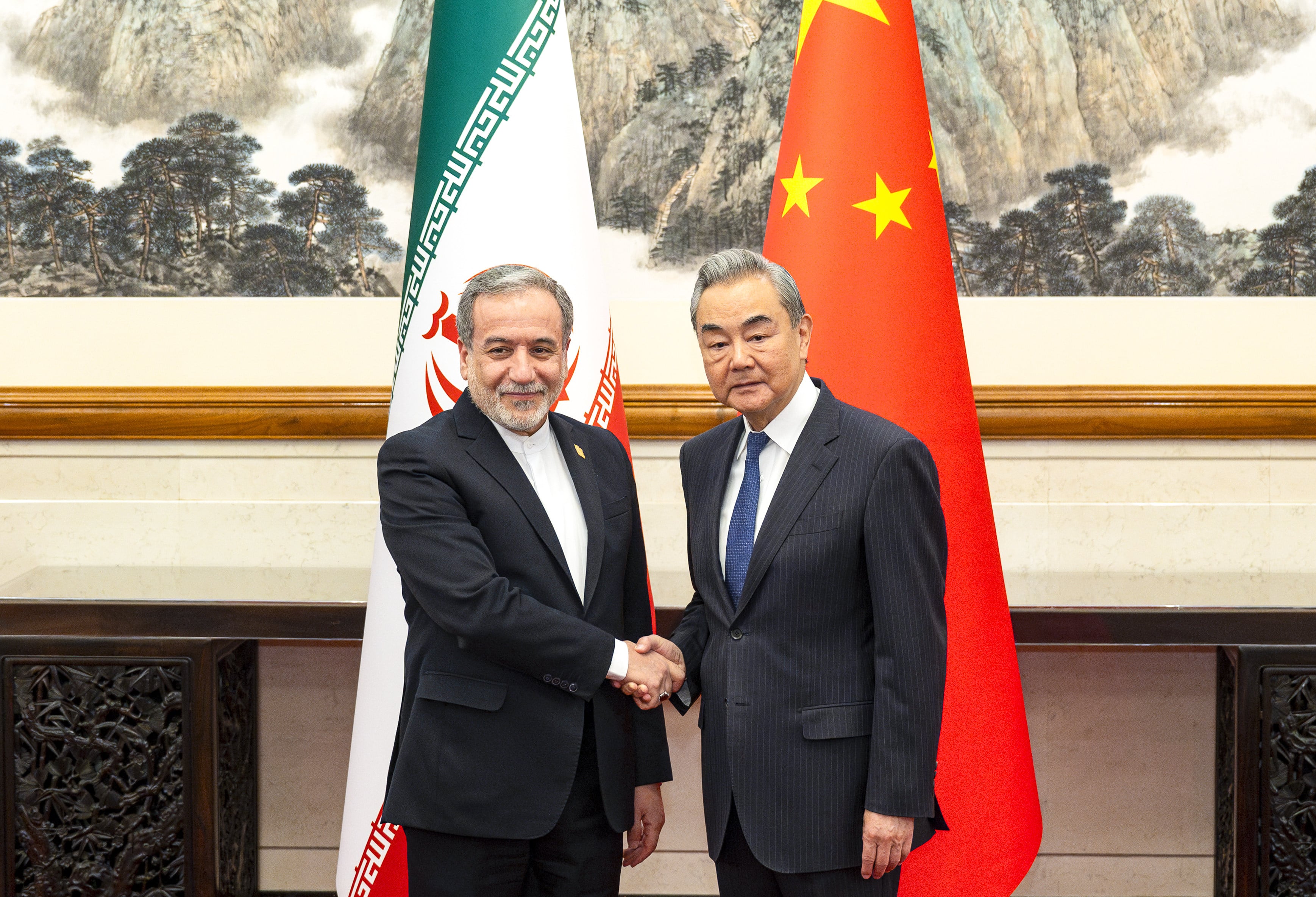 Iranian Foreign Minister Abbas Araghchi is greeted by Chinese Foreign Minister Wang Yi in Beijing on Wednesday. Photo: Xinhua
