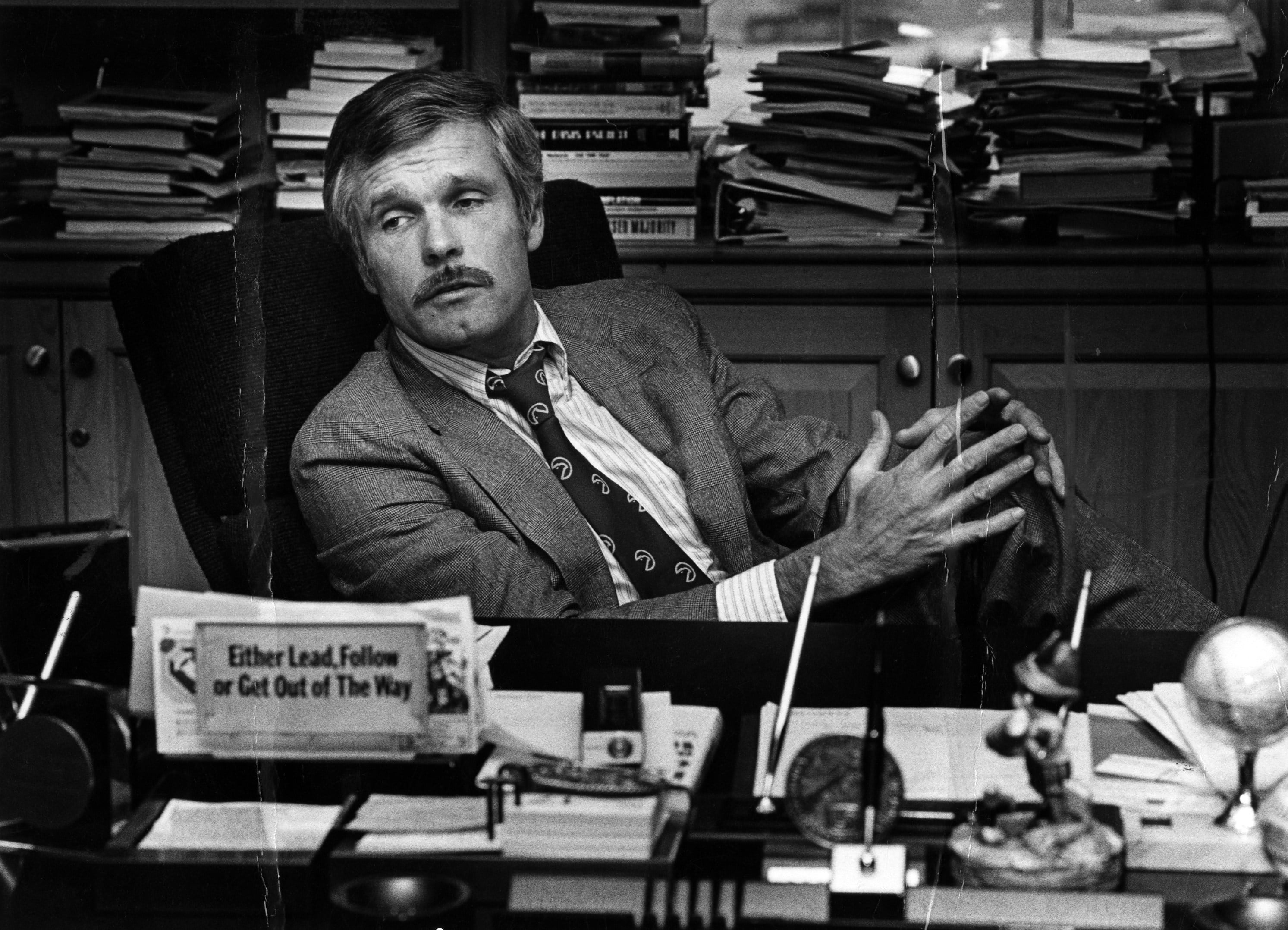 Ted Turner at his desk inside the CNN Center in 1982. Photo: via AP