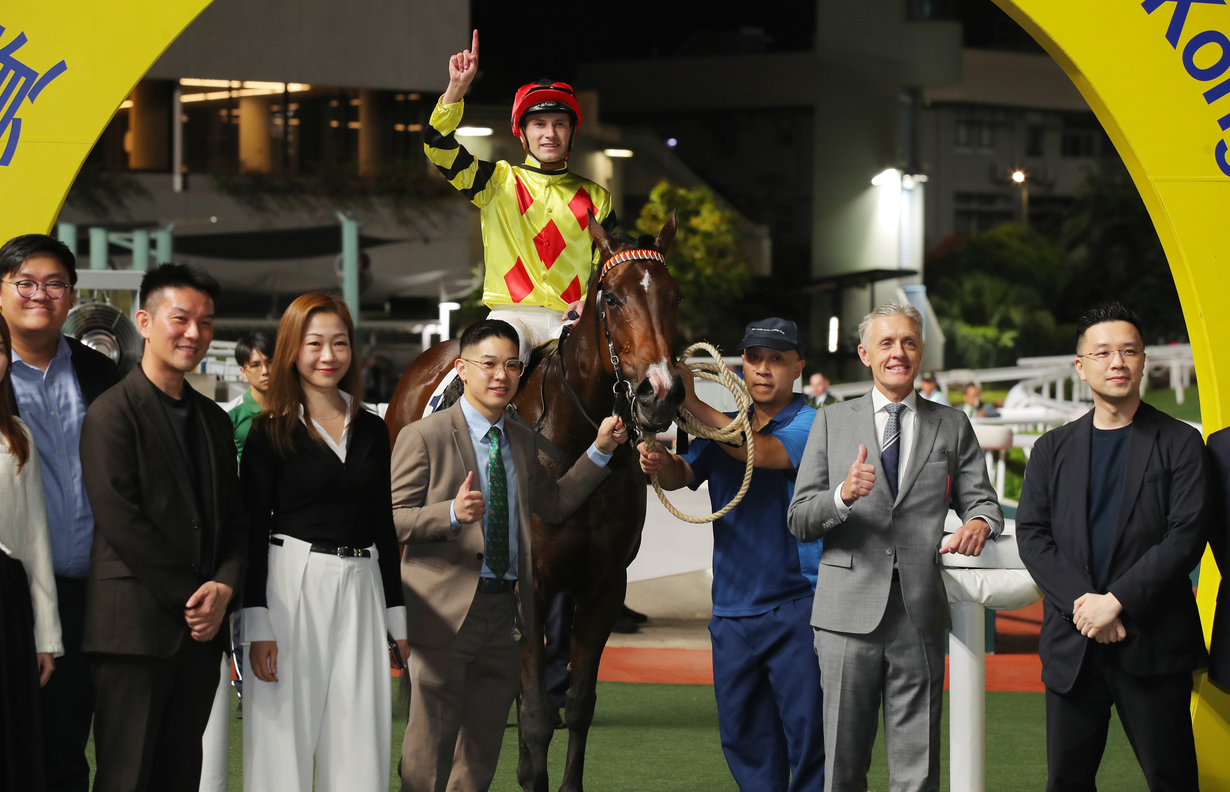 Mark Newnham, Luke Ferraris and connections celebrate the win of Notthesillyone at Sha Tin. Photos: Kenneth Chan