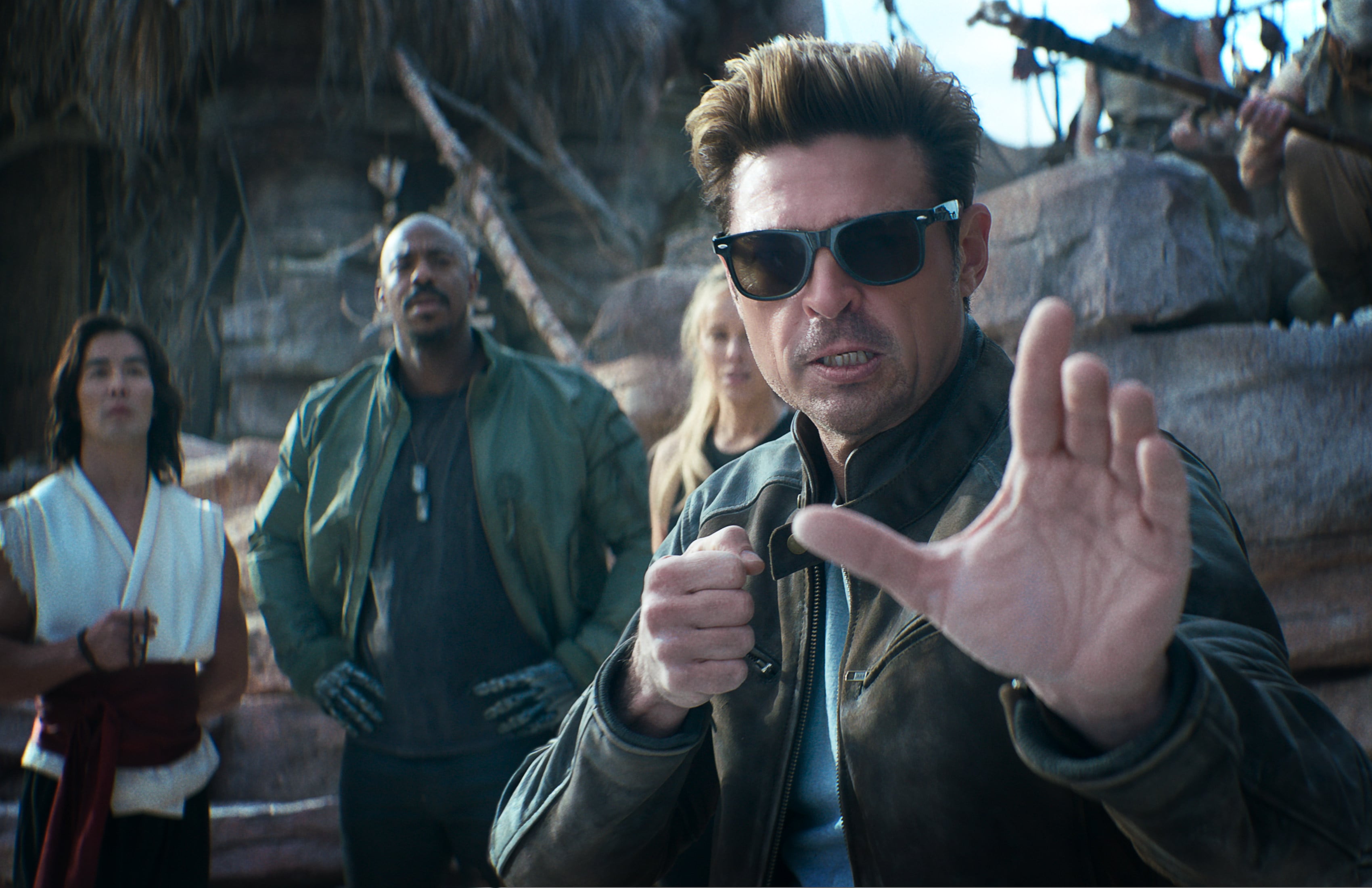 (From left) Ludi Lin as Liu Kang, Mehcad Brooks as Jackson “Jax” Briggs, Jessica McNamee as Sonya Blade and Karl Urban as Johnny Cage in a still from Mortal Kombat II (category III), directed by Simon McQuoid. Photo: Warner Bros