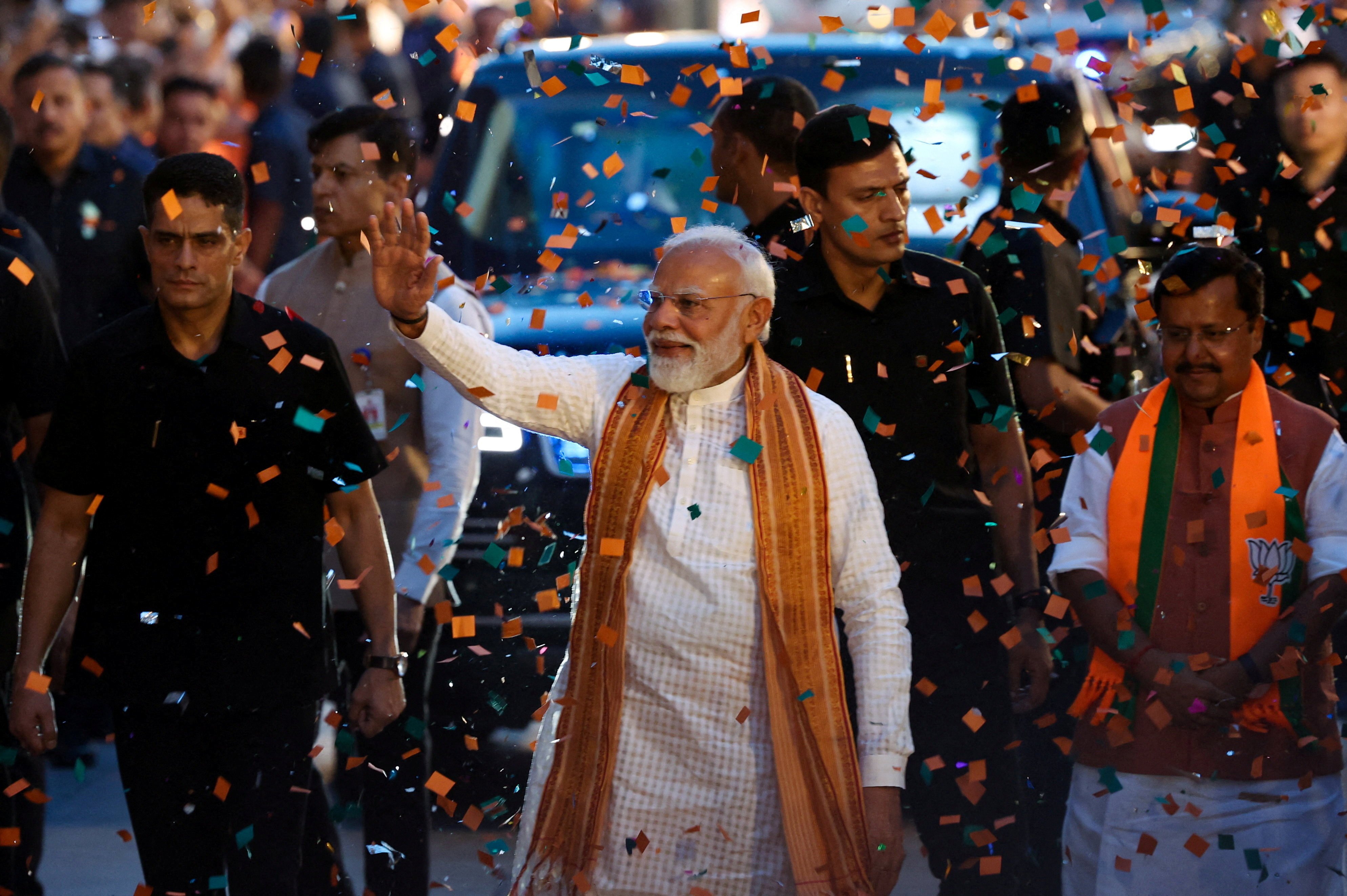 India’s Prime Minister Narendra Modi greets supporters as he arrives at BJP headquarters in New Delhi on Monday to celebrate that day’s election results. Photo: Reuters
