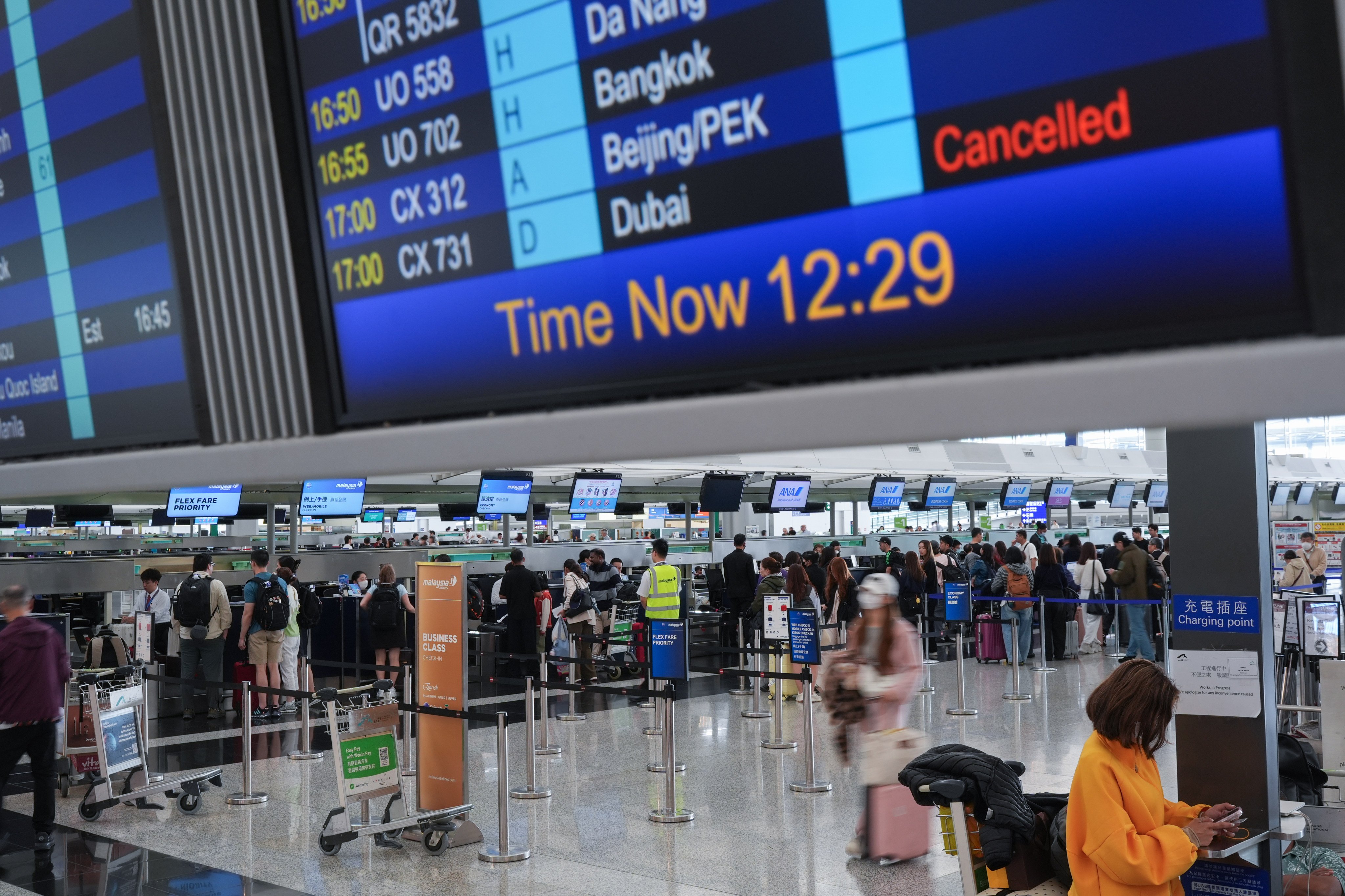 The Hong Kong Airport Authority reported fewer than 5 per cent of flights were cancelled in May and June, and about 1 per cent in July.  Photo: Eugene Lee