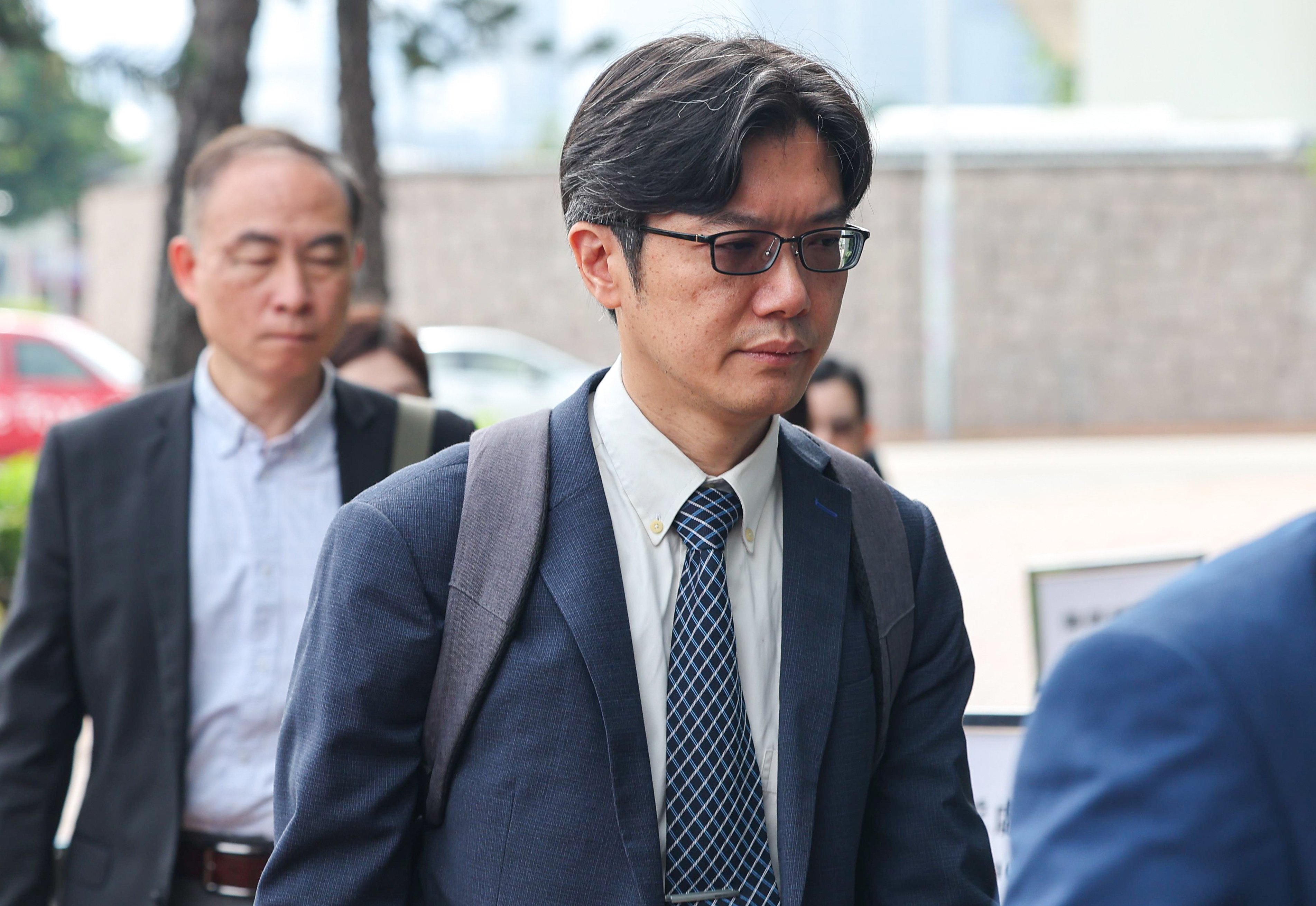 Yung Siu-lun arrives at City Gallery in Central for the fire hearing. Photo: Edmond So
