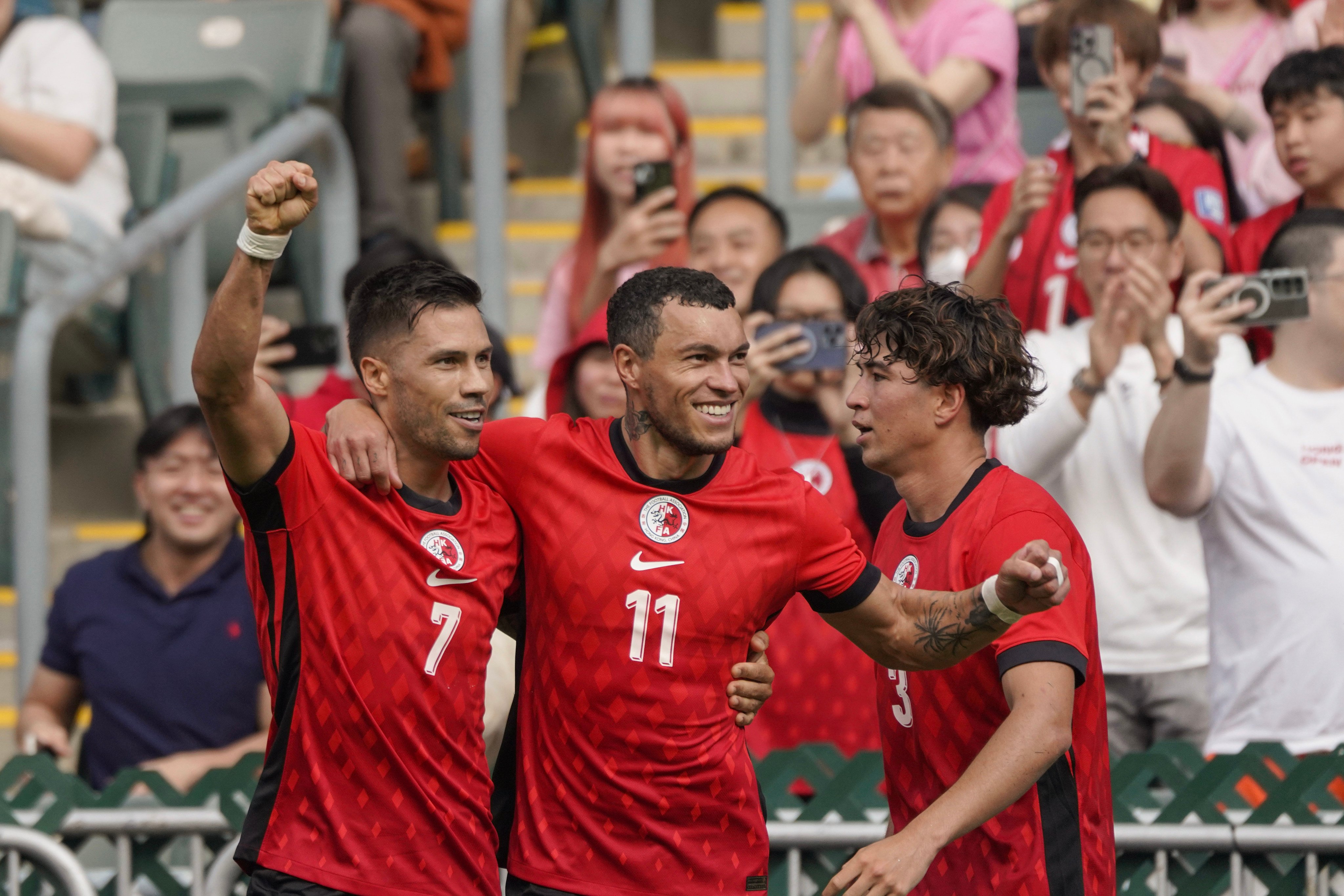 Hong Kong trio (from left) Juninho, Everton Camargo and Jay Haddow celebrate a goal against FC Seoul back in February. Photo: Karma Lo