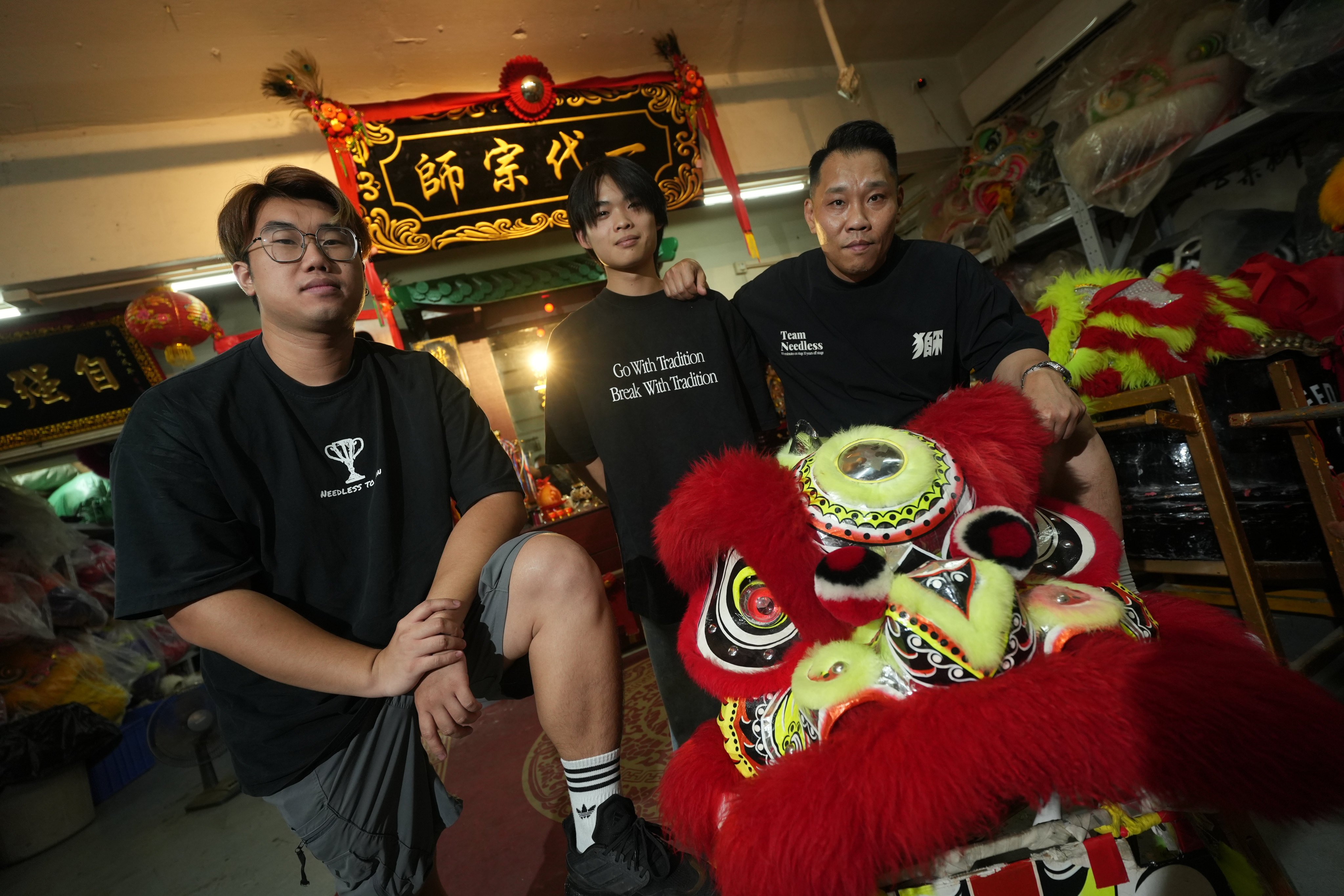 From left, lion dance athletes John Siu and Jay Keung with their head coach, Keung Wai-hong. Photo: Sun Yeung